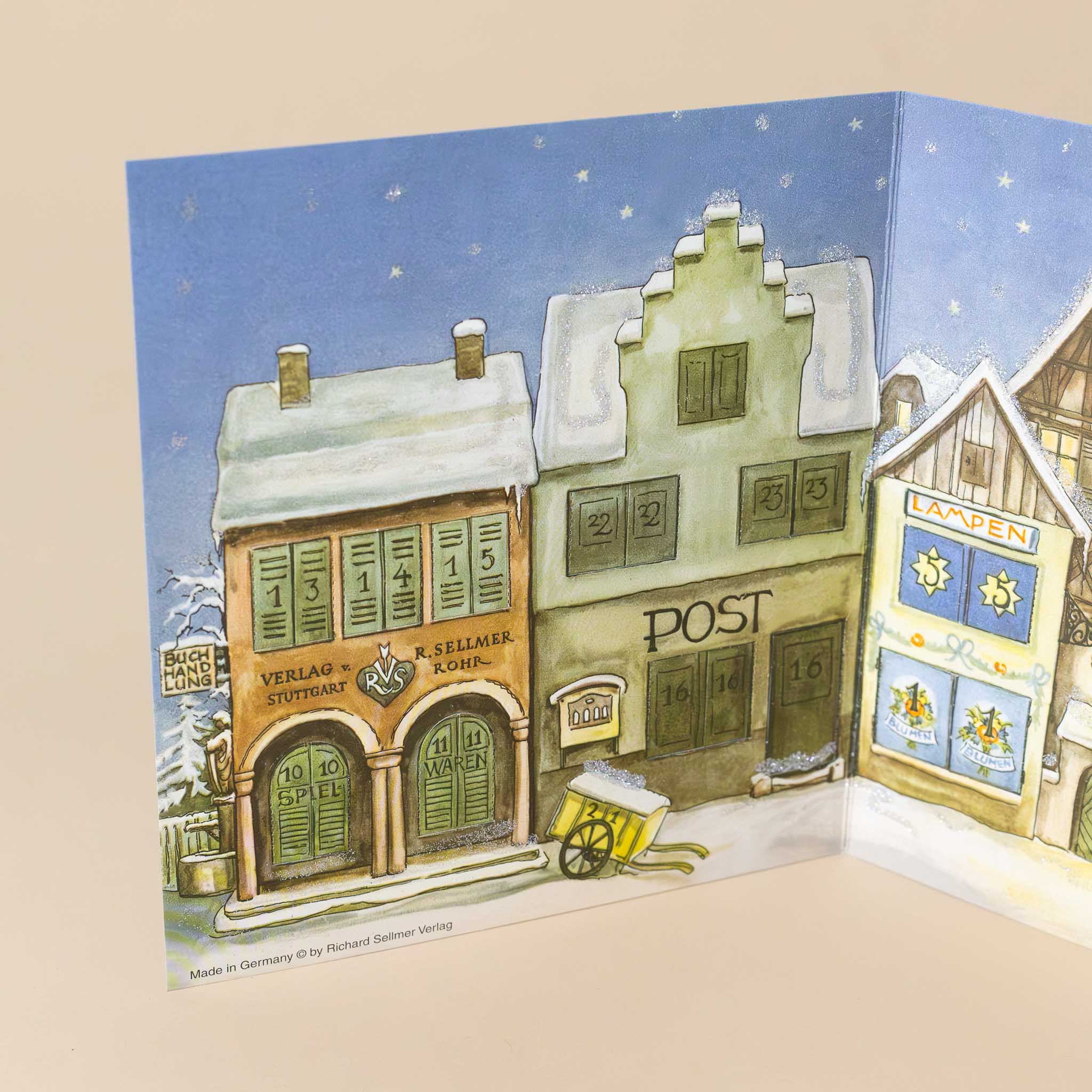 german-advent-calendar-village-street-with-cute-storefronts-a-church-and-houses