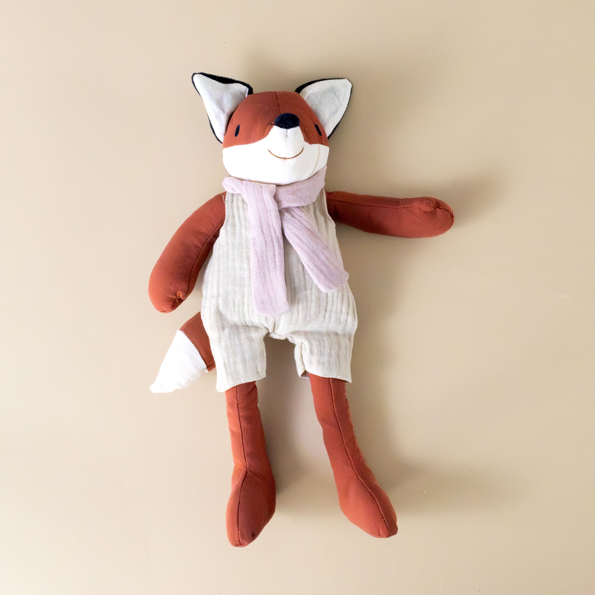 alphonse-the-fox-rattle-with-coveralls-and-scarf