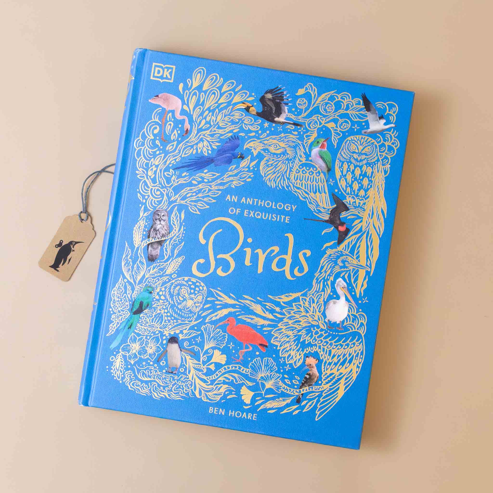 an-anthology-of-exquisite-birds-blue-cover-with-gold-wording-and-detail-and-colorful-birds