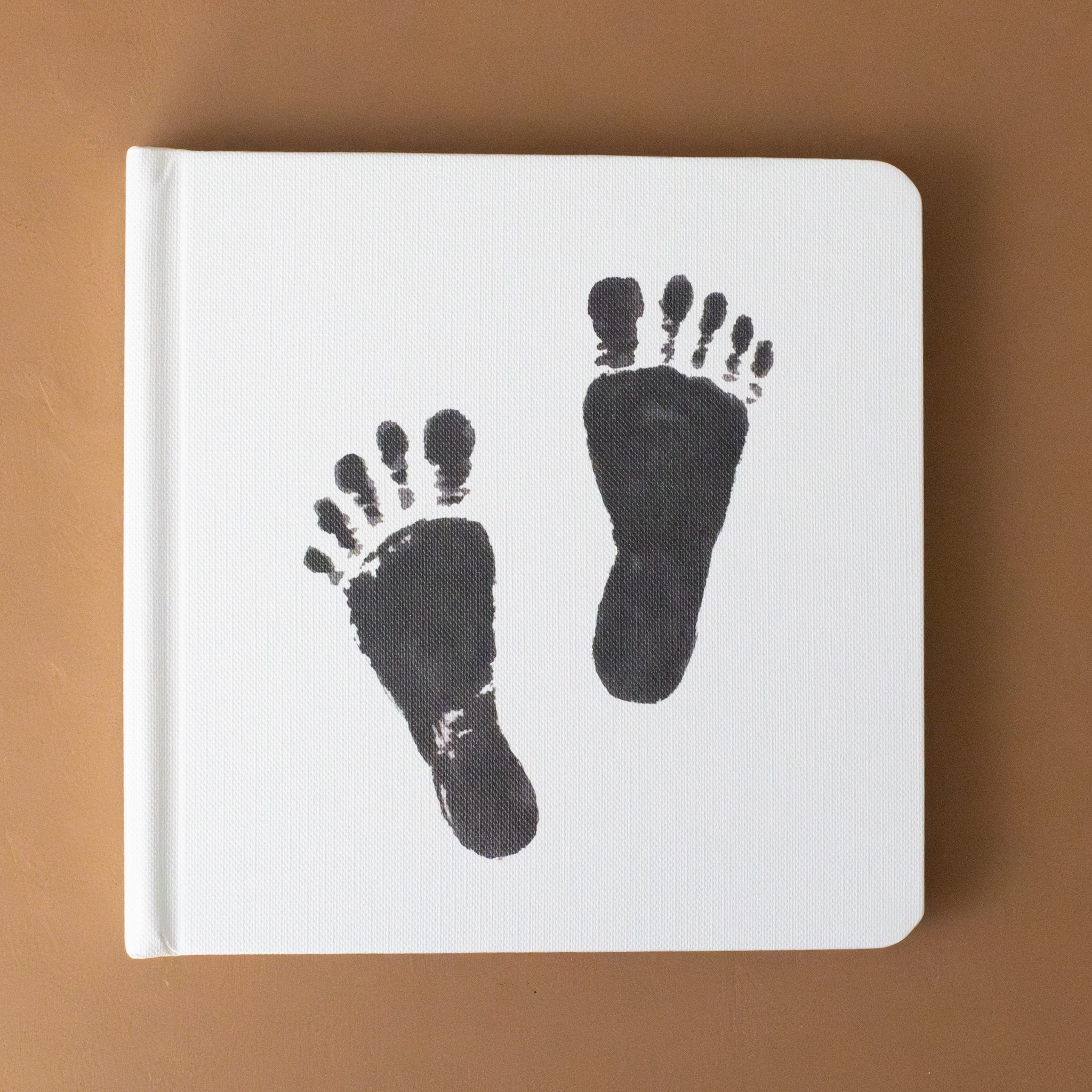 baby-feet-in-black-and-white-on-first-book-cover