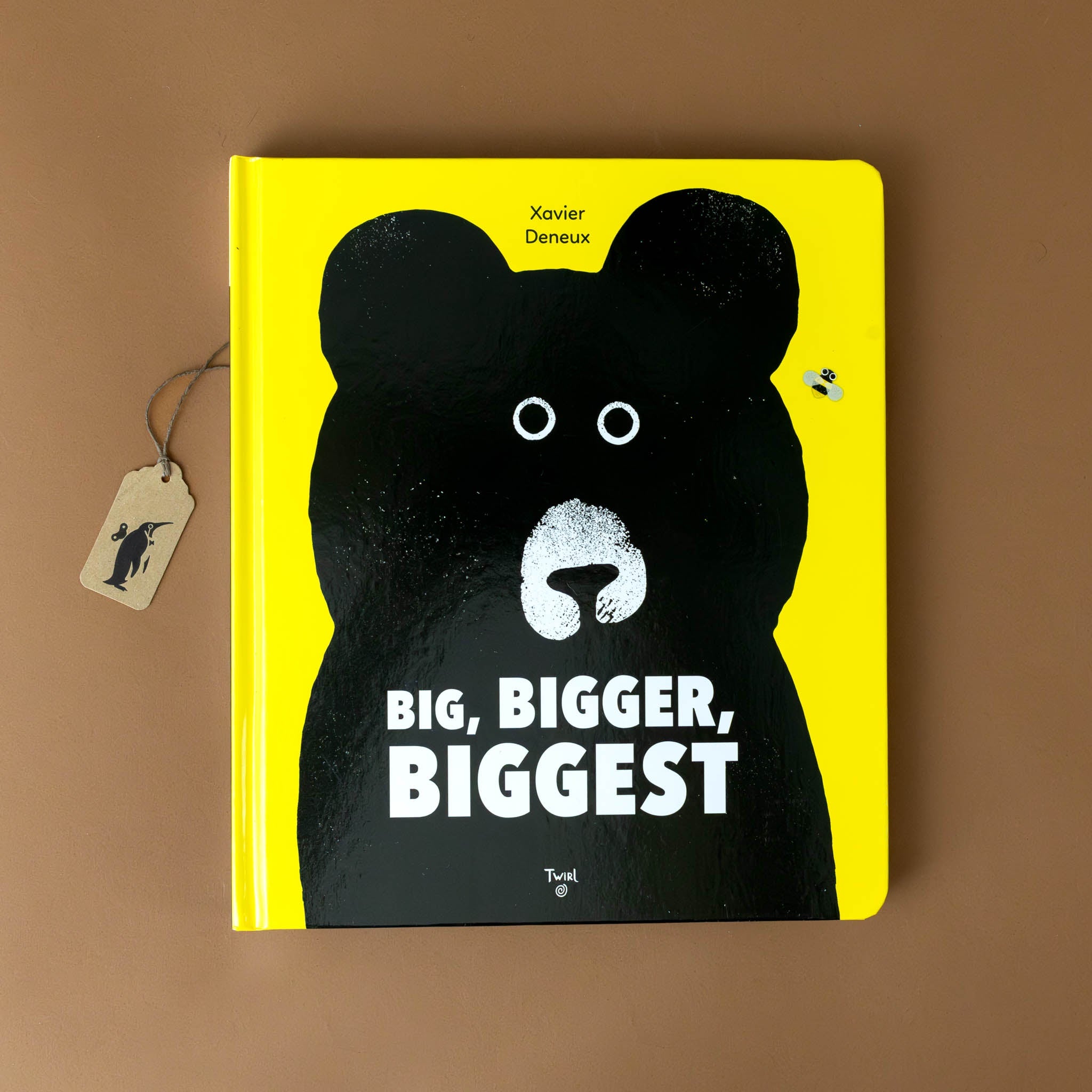 big-bigger-biggest-book-cover-with-a-wide-eyed-bear-on-a-yellow-background