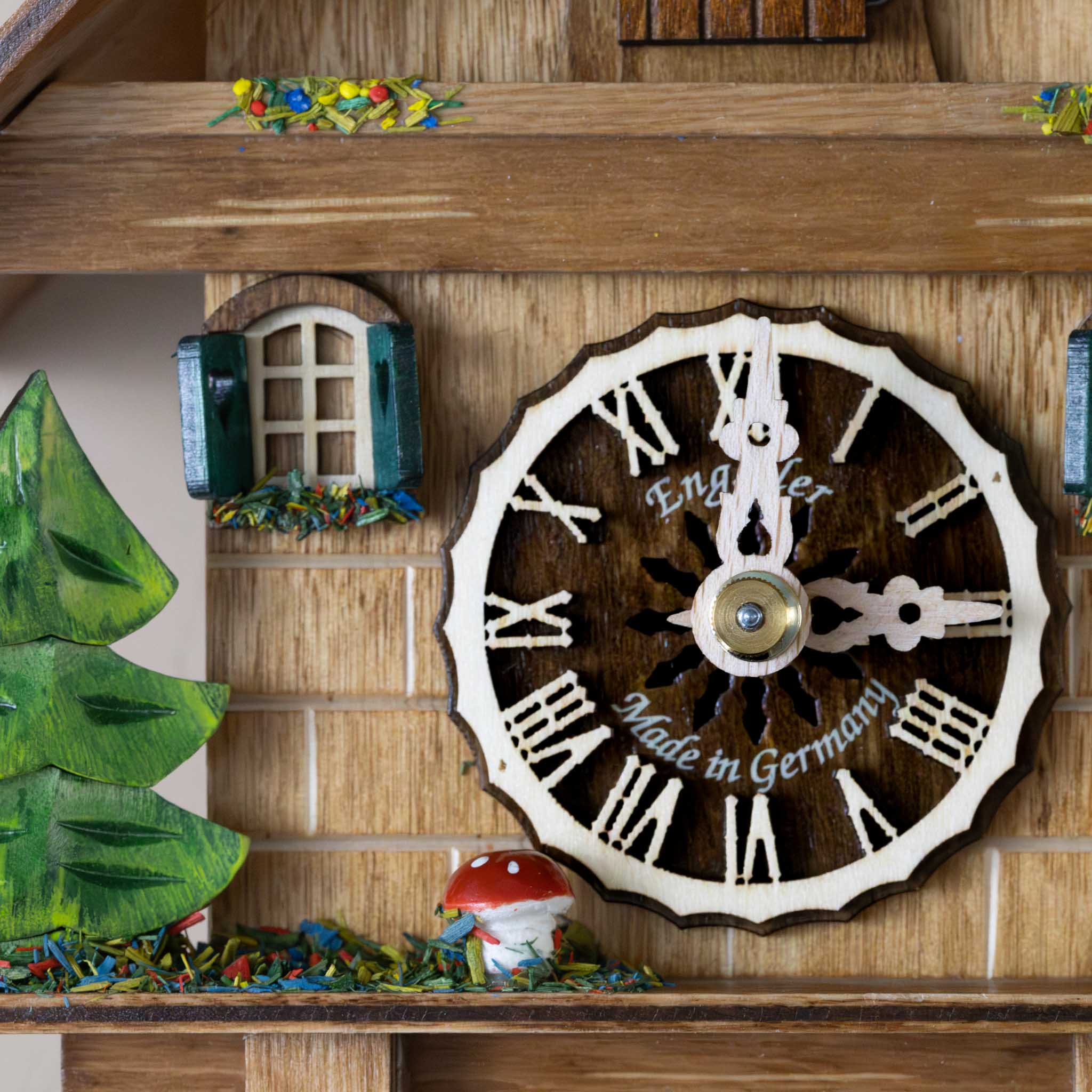 black-forest-mechanical-cuckoo-clock-chalet-windows-mushroom-and-clock-face