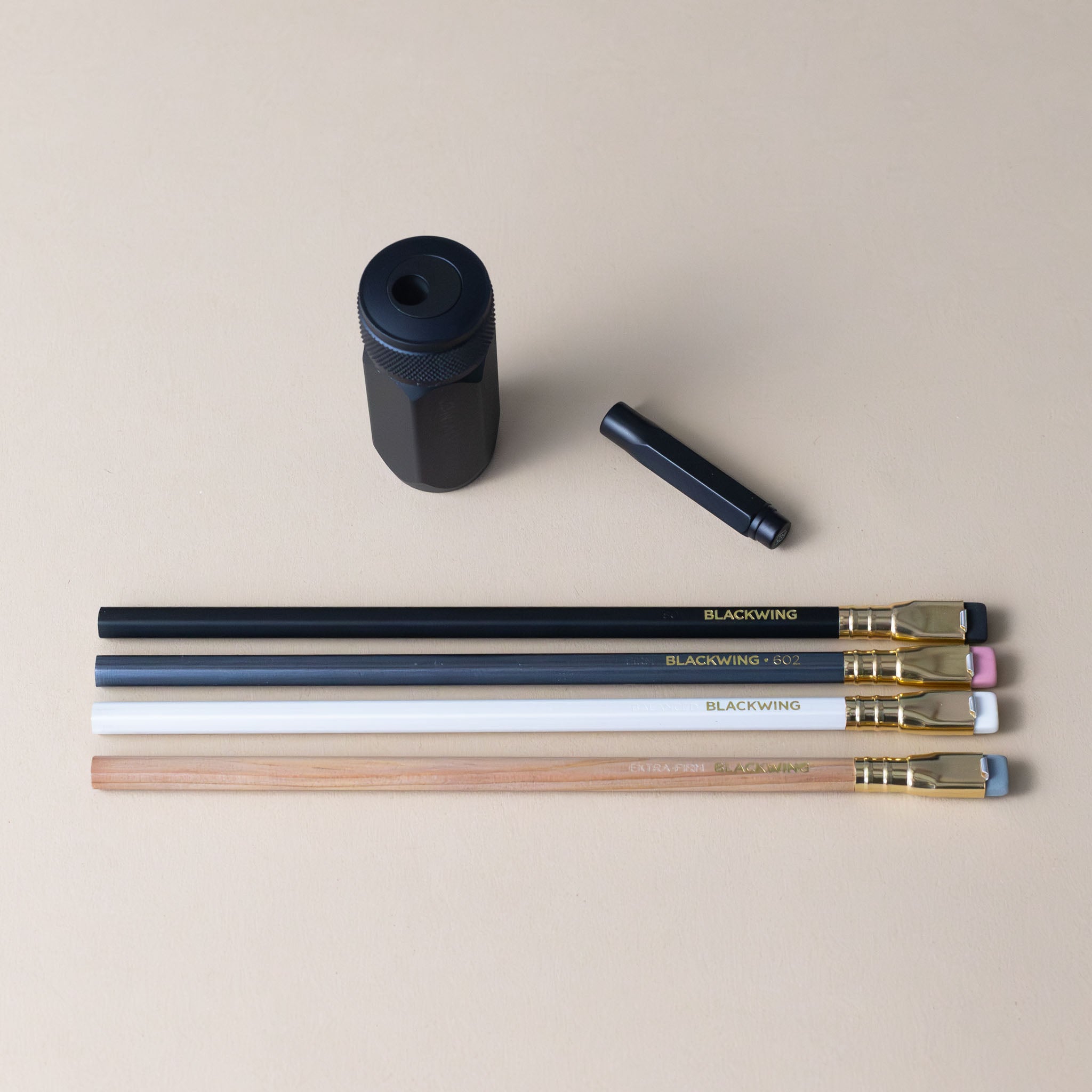 blackwing-pencil-essentials-set-displayed-4-pencils-sharpener-and-point-guard