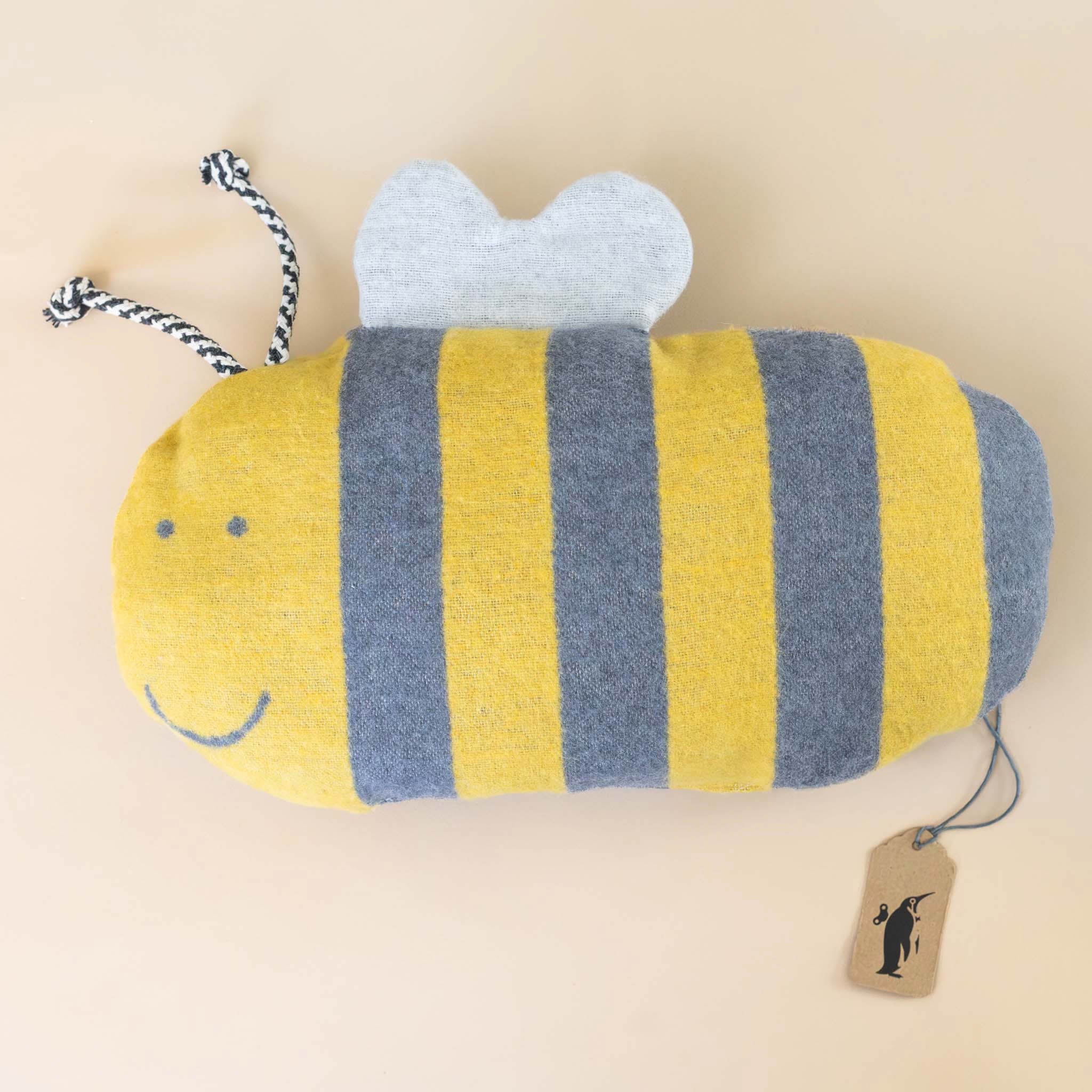 yellow-and-grey-striped-bumble-bee-cushion-pillow-with-white-wings-and-yellow-and-black-corded-antenna