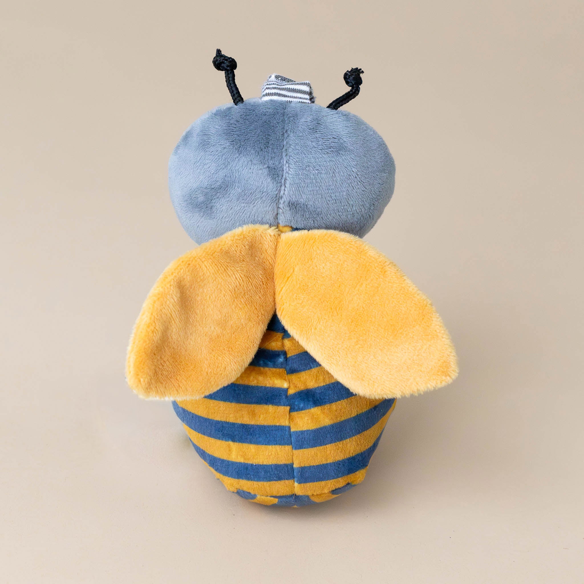 buzzbee-the-bumblebee-stuffed-animal-with-striped-yellow-and-grey-body-grey-cap-black-antenae-ring-for-attaching-to-stroller-and-striped-legs-yellow-wings