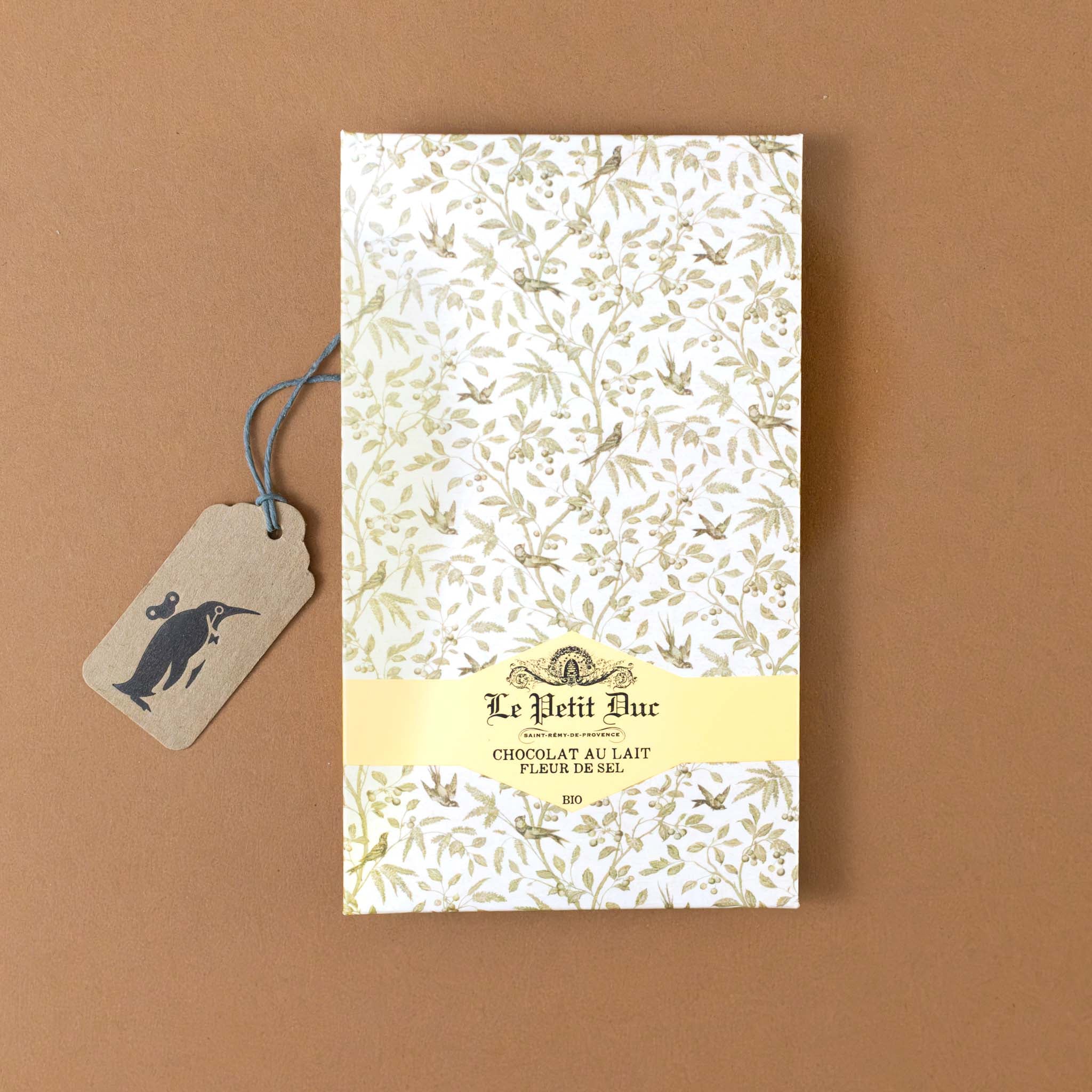 chocolat-au-lait-bar-fleur-de-sel-wrapped-in-decorative-paper