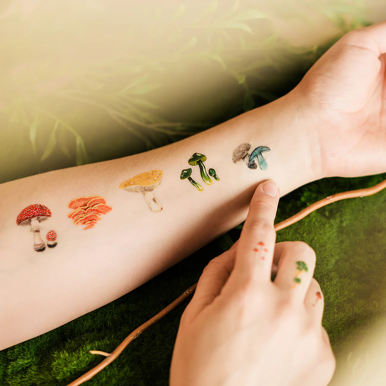 colorful-mushrooms-temporary-tattoo-sheet-applied-to-arms-and-fingers