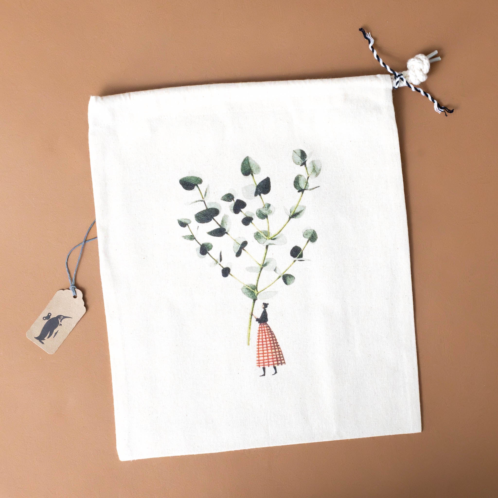 cotton-drawstring-pouch-woman-holding-eucalyptus