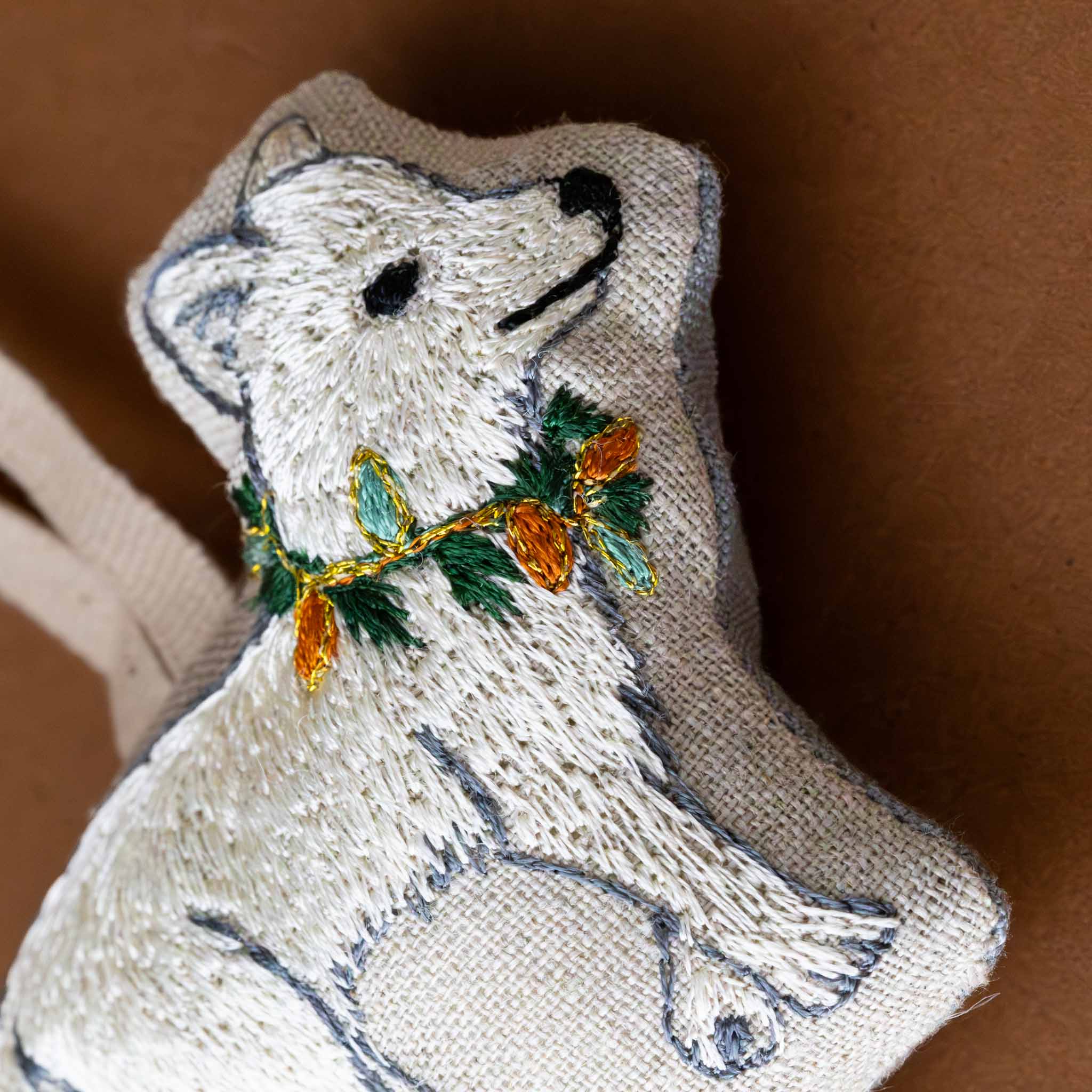 embroidered-ornament-bright-white-fox-lights-around-neck