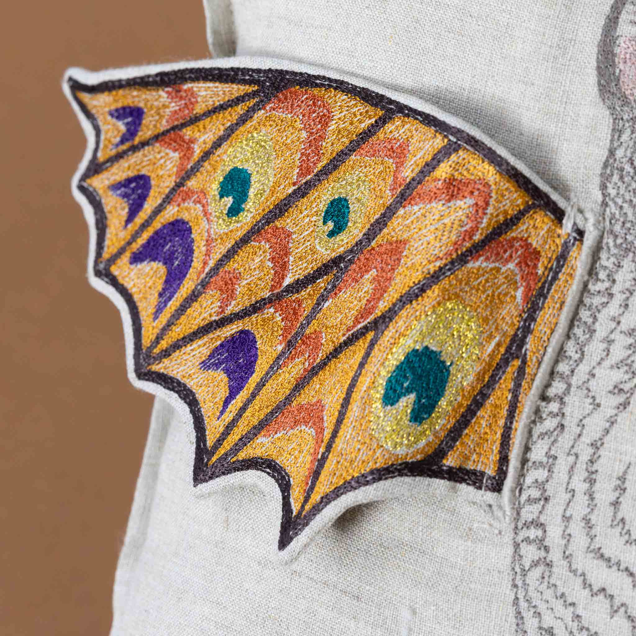 embroidered-pillow-bat-wing-surprise-wing