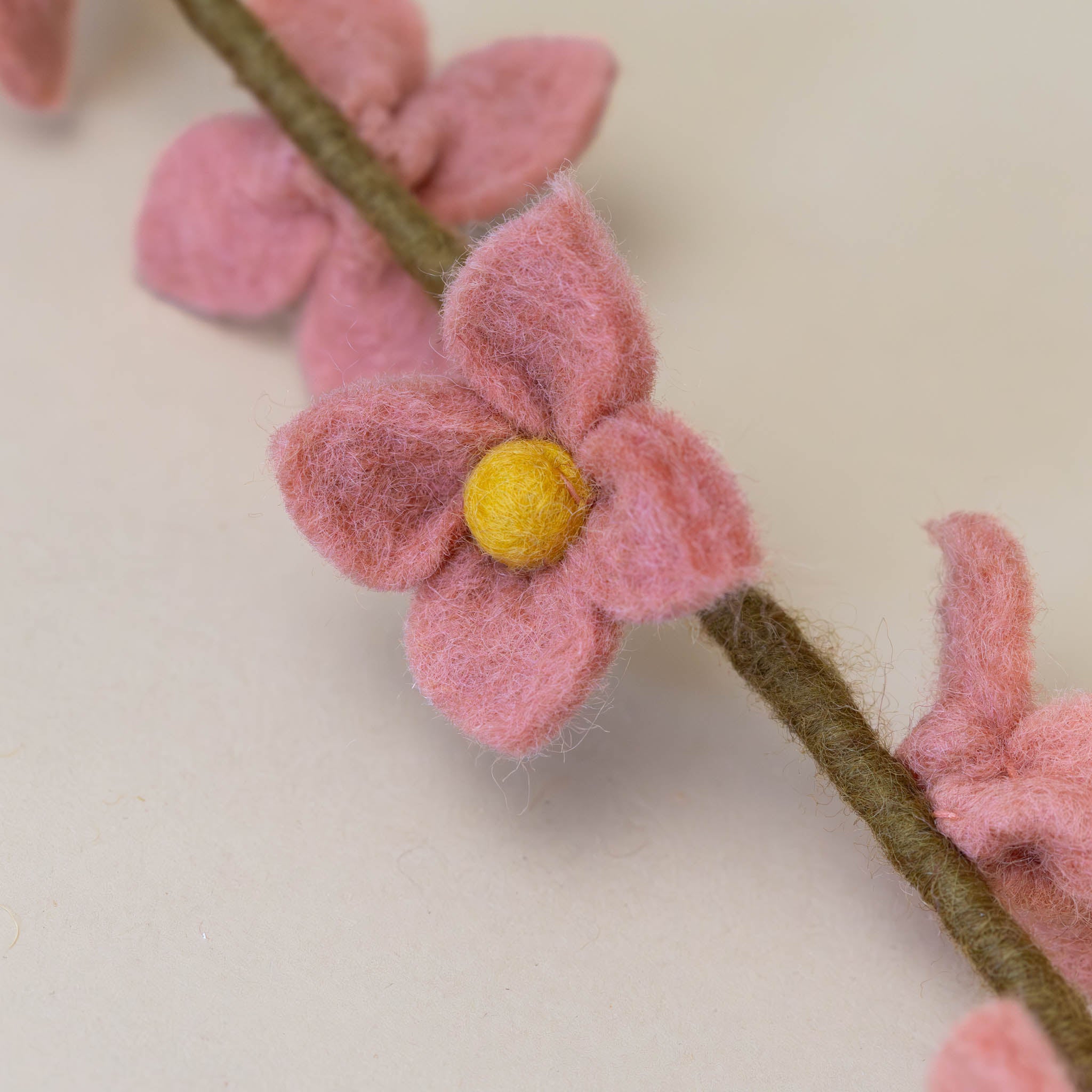 felt-flower-stalk-salmon-with-yellow-center