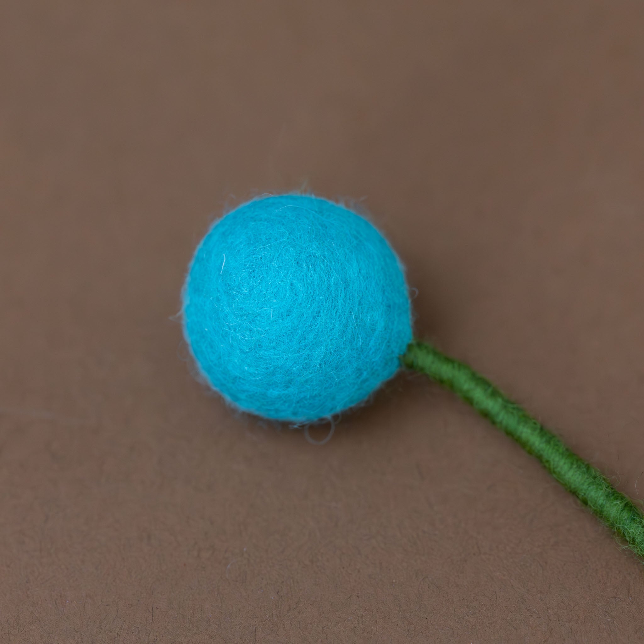 felt-pom-flower-aqua-up-close