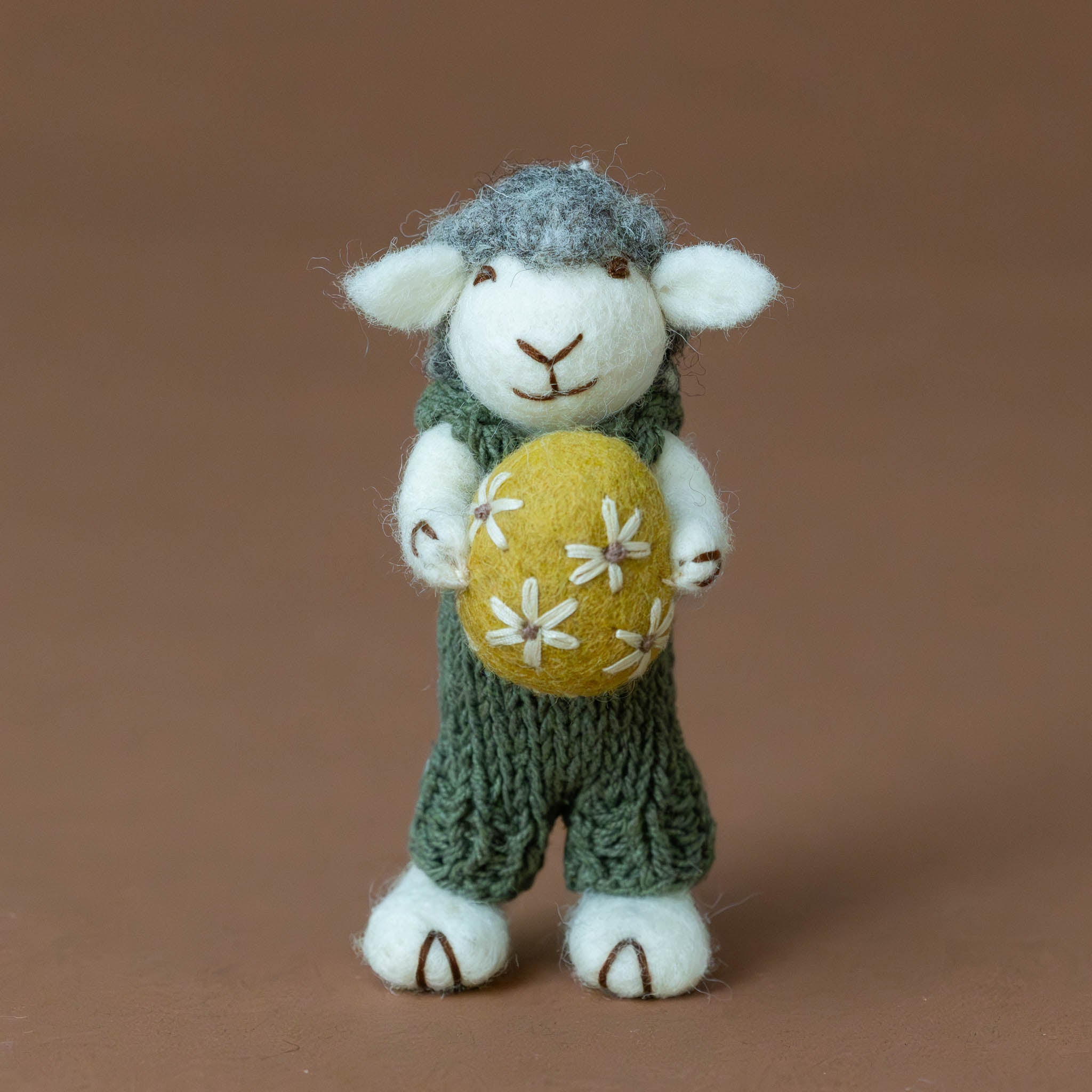 felted-grey-sheep-ornament--green-overalls-with-ochre-egg-