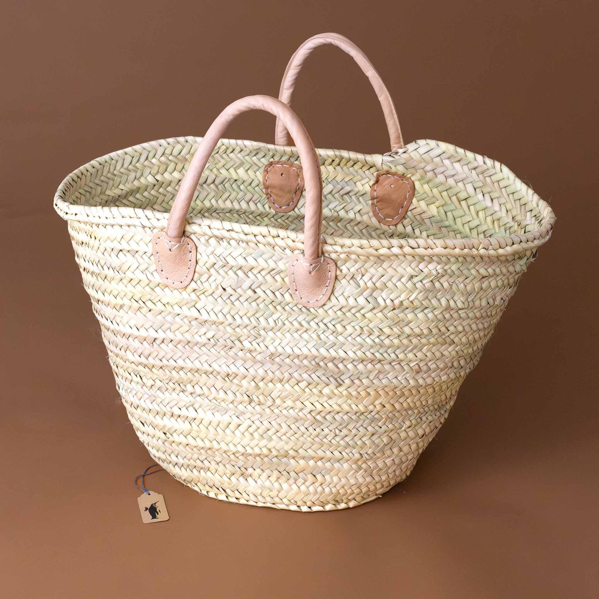 woven-handbag-with-warm-brown-leather-handles