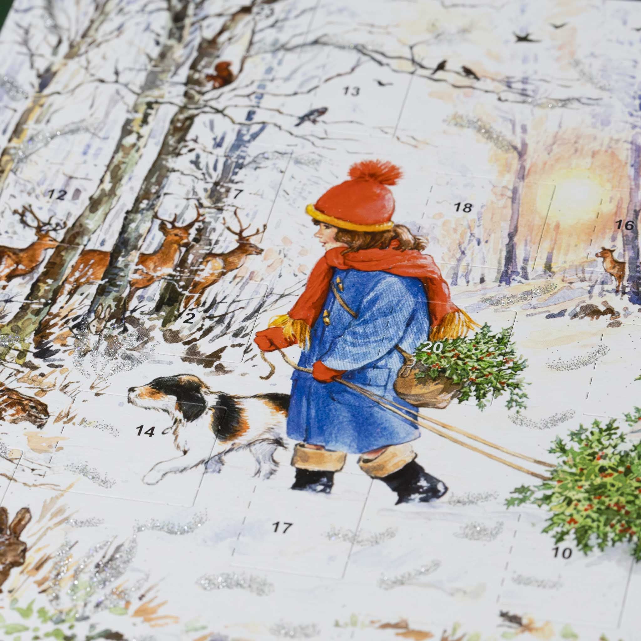 german-advent-calendar-with-children-pulling-a-sled-through-the-forest-with-their-finds-as-deer-watch-and-their-dog-is-accompanying-them