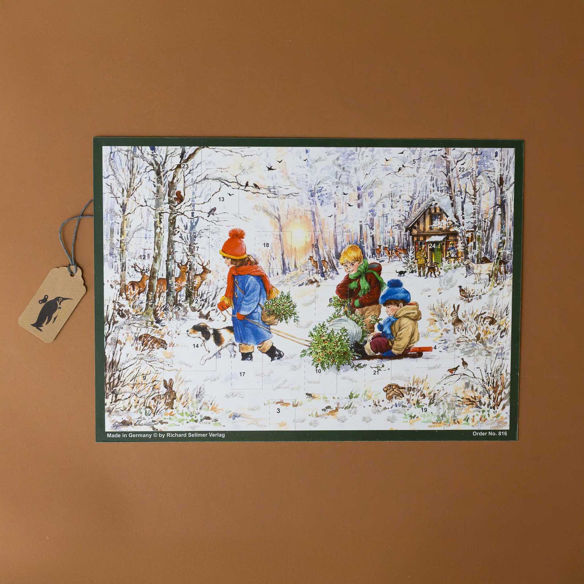 german-advent-calendar-with-children-pulling-a-sled-through-the-forest-with-their-finds-as-deer-watch-and-their-dog-is-accompanying-them