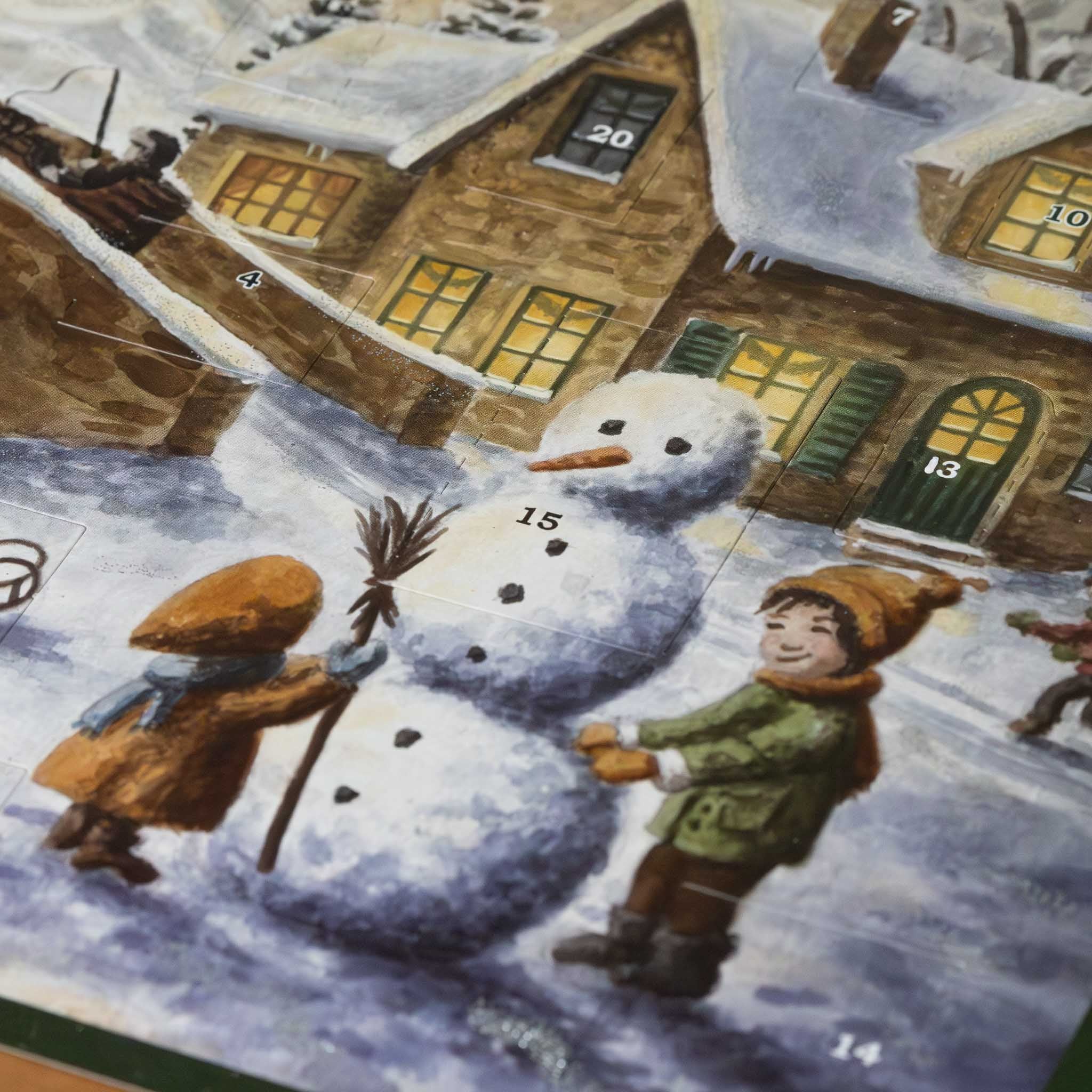 german-advent-calendar-river-crossing-with-children-building-a-snowman-with-a-beautiful-snow-covered-cottage-behind-them