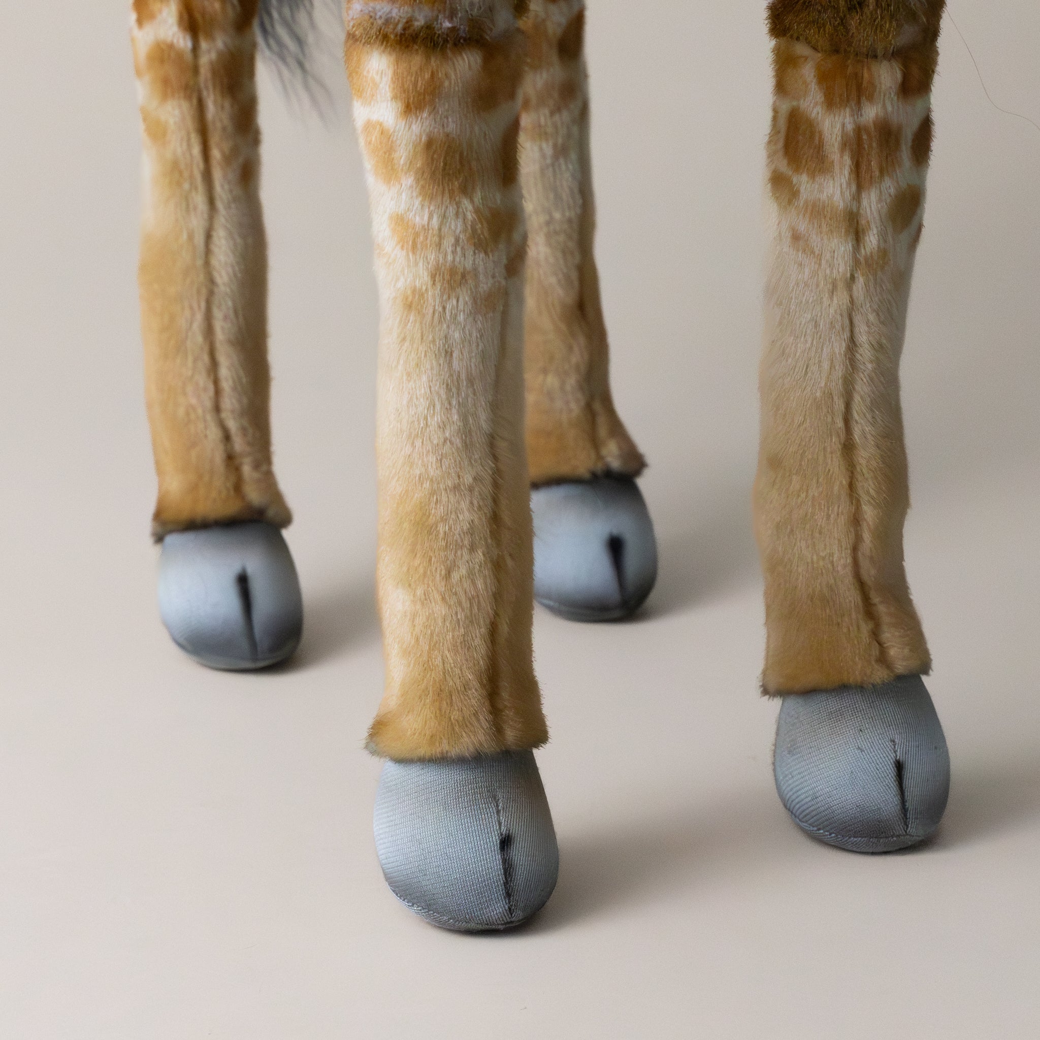 giraffe--standing-stuffed-animal-hooves