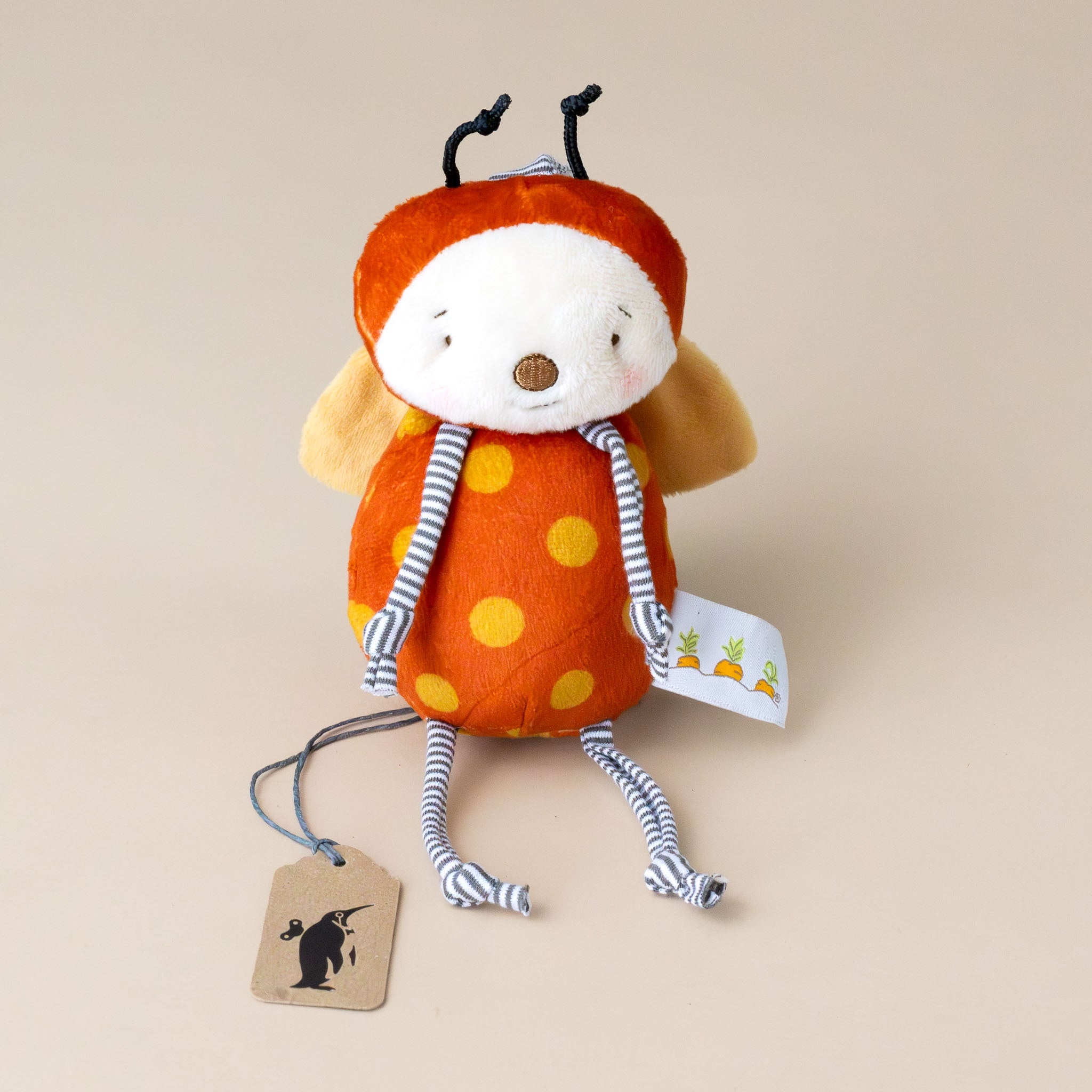 orange-and-yellow-polka-dotted-girlbug-ladybird-rattle-with-striped-legs-and-black-antenna-with-velcro-strap-for-attaching-to-stroller