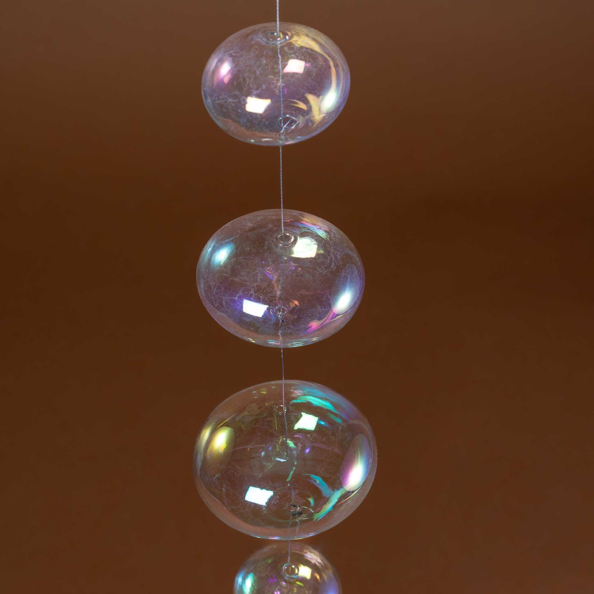 up-close-clear-glass-ball-strung-together