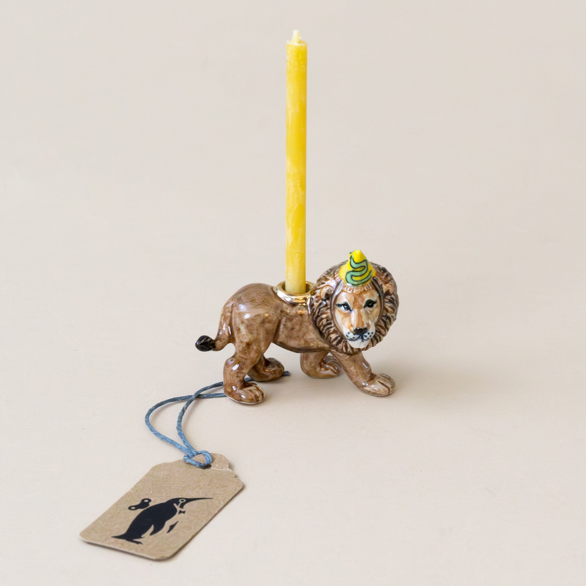 heirloom-porcelain-cake-topper-lion-with-candle