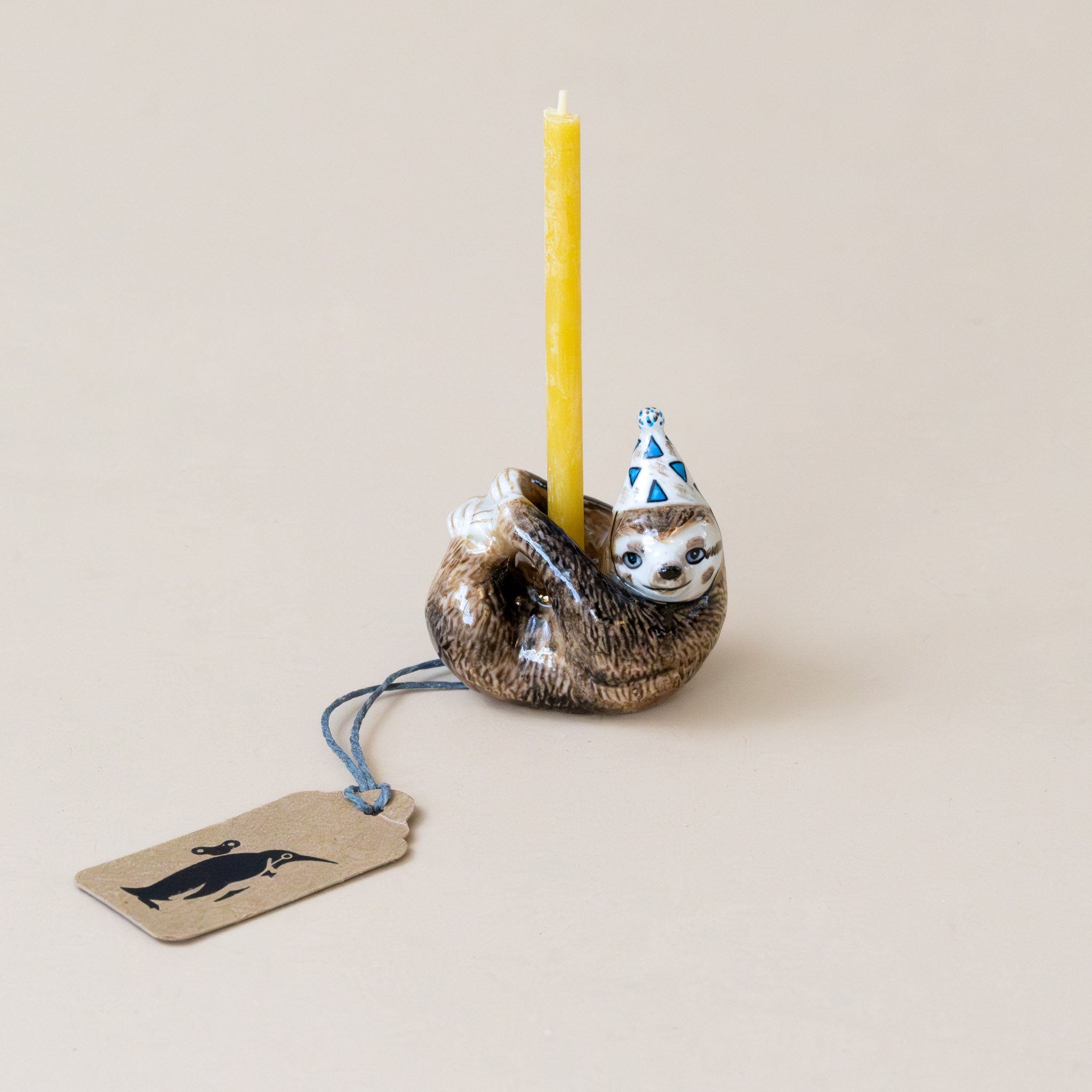 heirloom-porcelain-cake-topper-sloth-with-candle