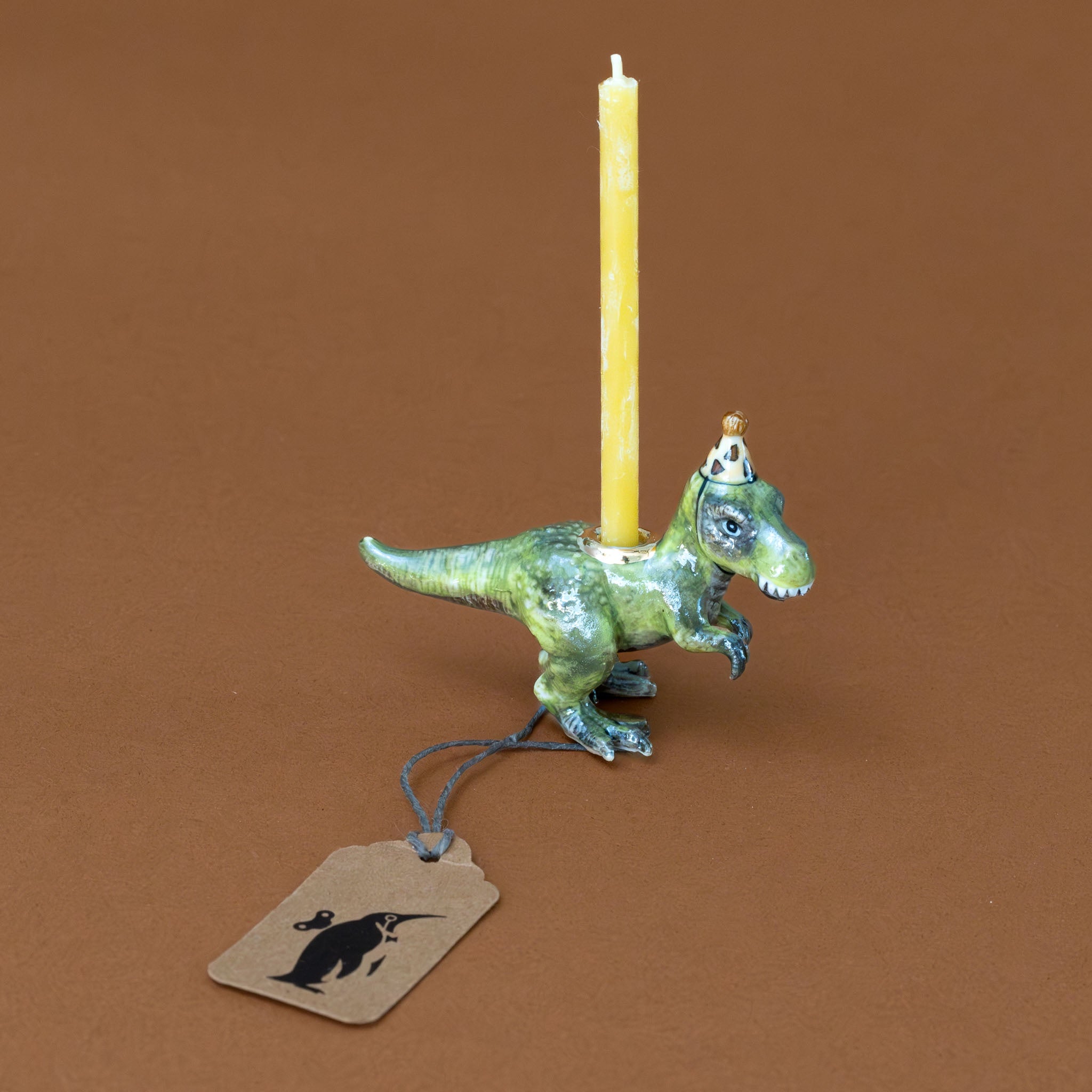 heirloom-porcelain-cake-topper-t-rex-dinosaur-with-candle