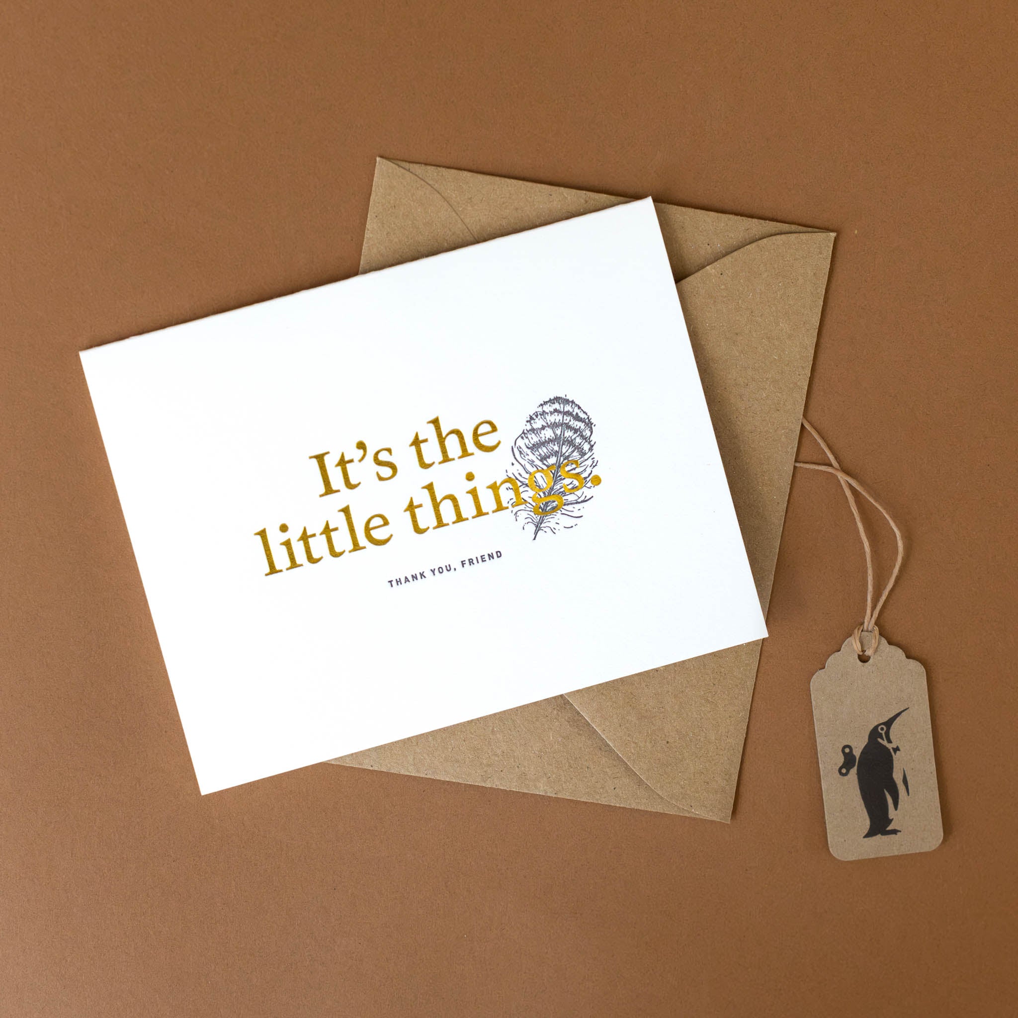 its-the-little-things-greeting-card-with-a-feather-highlighting-gold-foil-sentiment