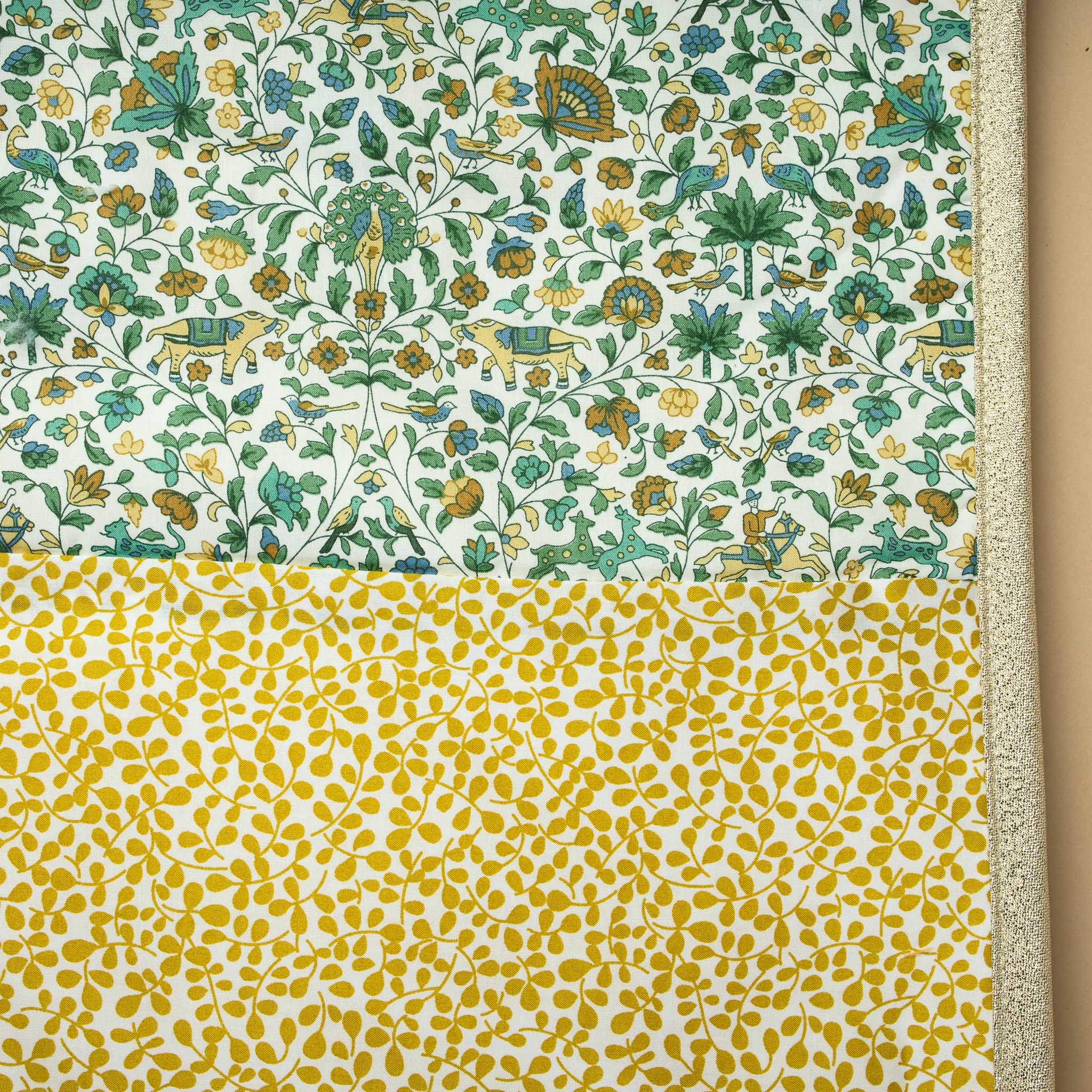 detail-showing-green-gold-and-yellow-print-with-gold-lame-bias