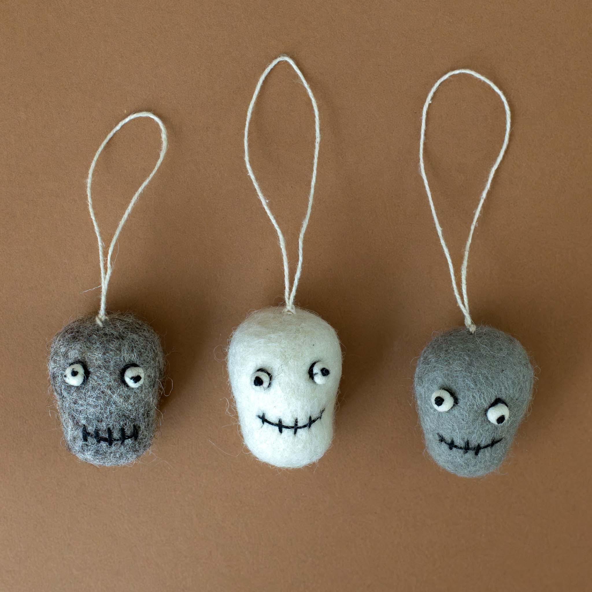 little-skeleton-head-ornament-trio-grey-and-white