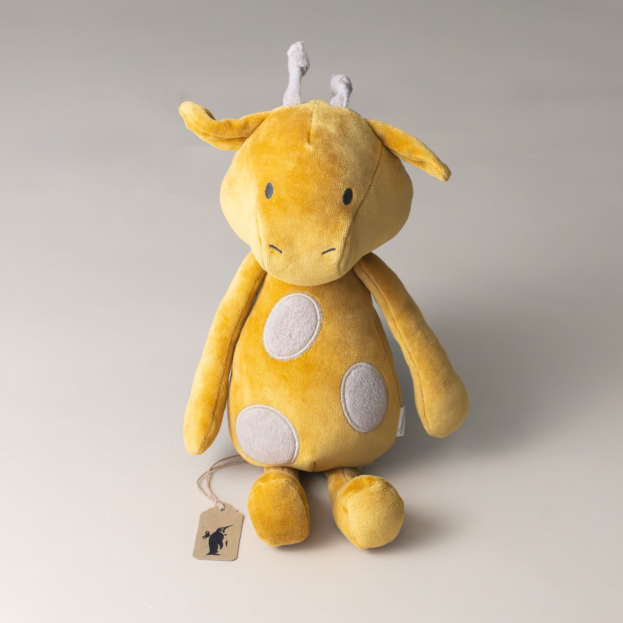 olivia-the-giraffe-stuffed-animal-sitting