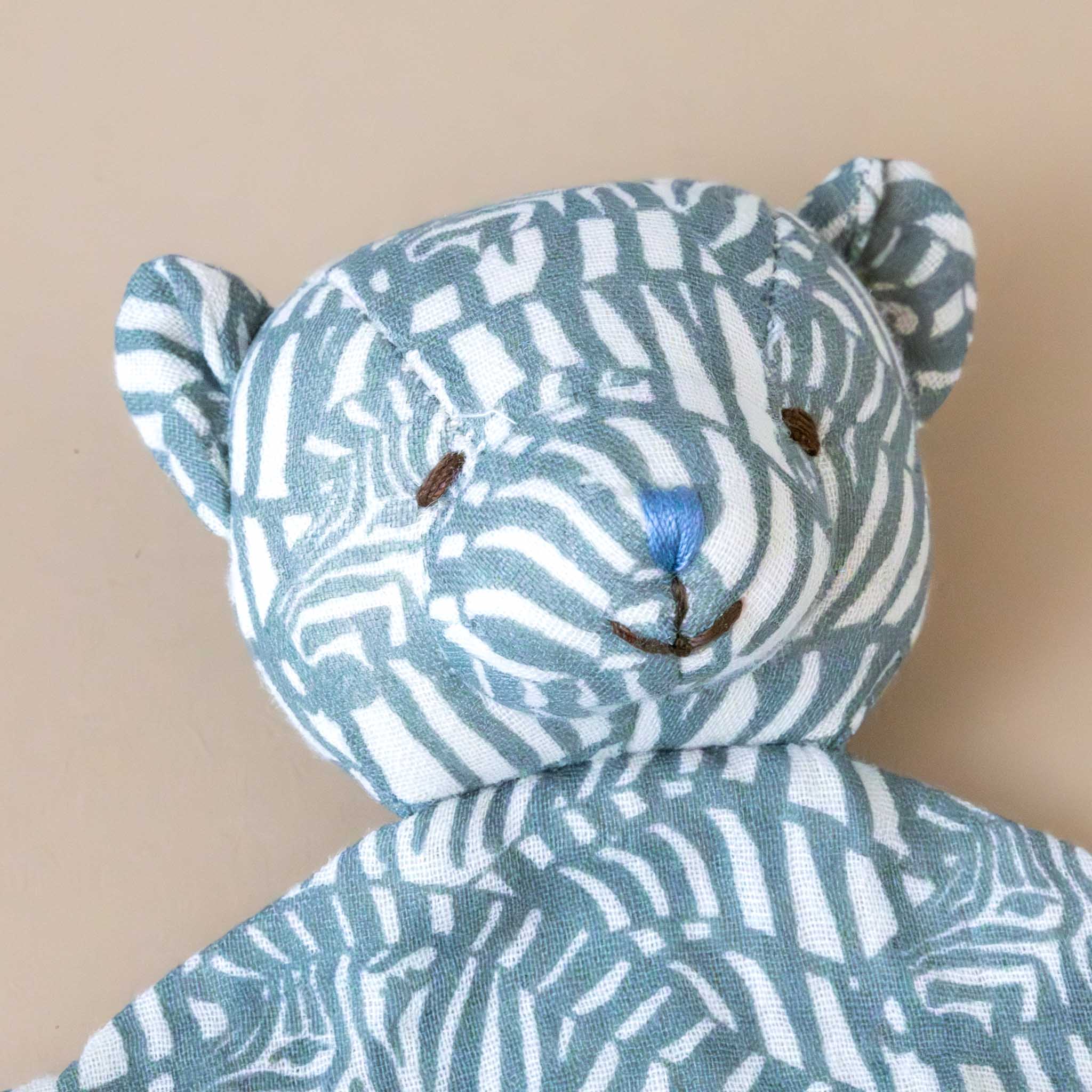 organic-cotton-bear-lovie-sage-zebras-embroidered-eyes-and-nose