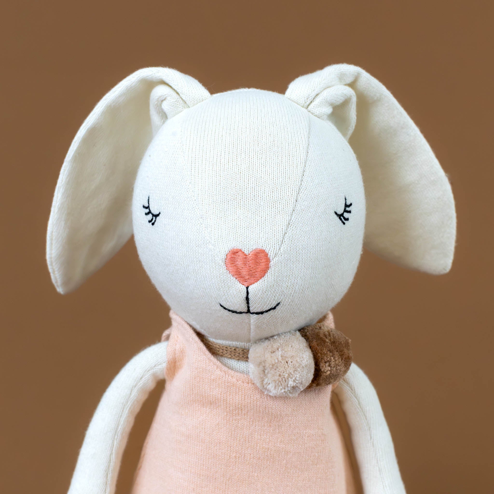 organic-knit-woodland-pal--charlotte-bunny-with-pink-scallop-dress-embroidered-eyes-nose-and-mouth