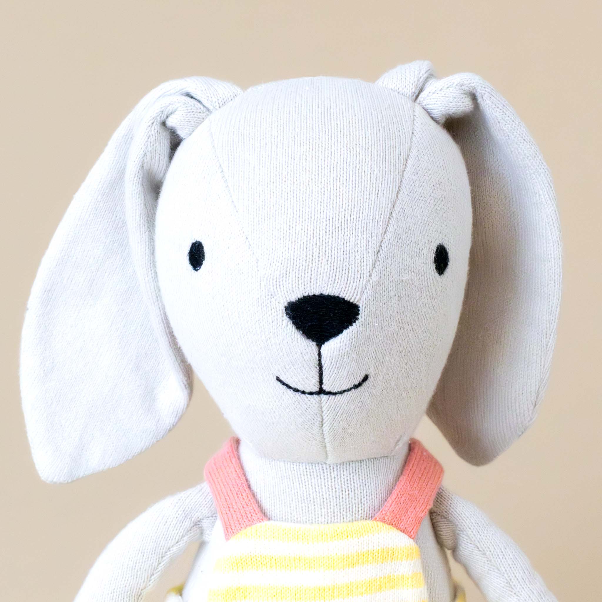 organic-knit-woodland-pal-buddy-bunny-with-sunshine--stripes-embroidered-nose-eyes-mouth