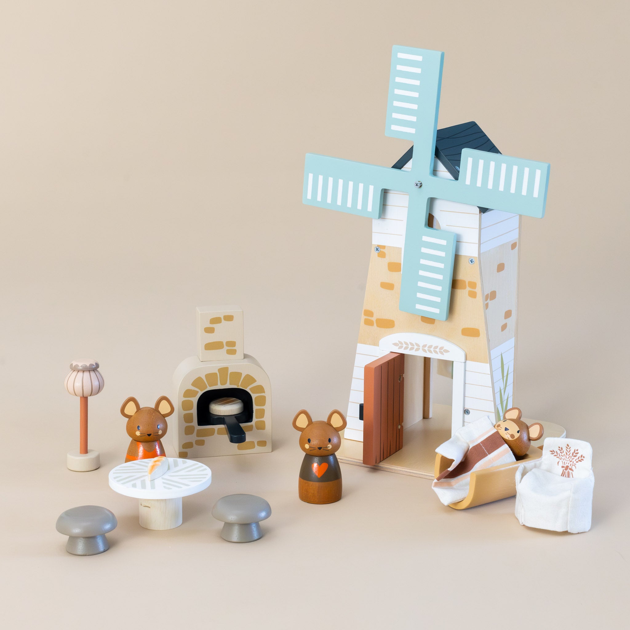 penny-windmill-play-set-with-3-mice-an-outdoor-pizza-oven-table-lamp-chairs