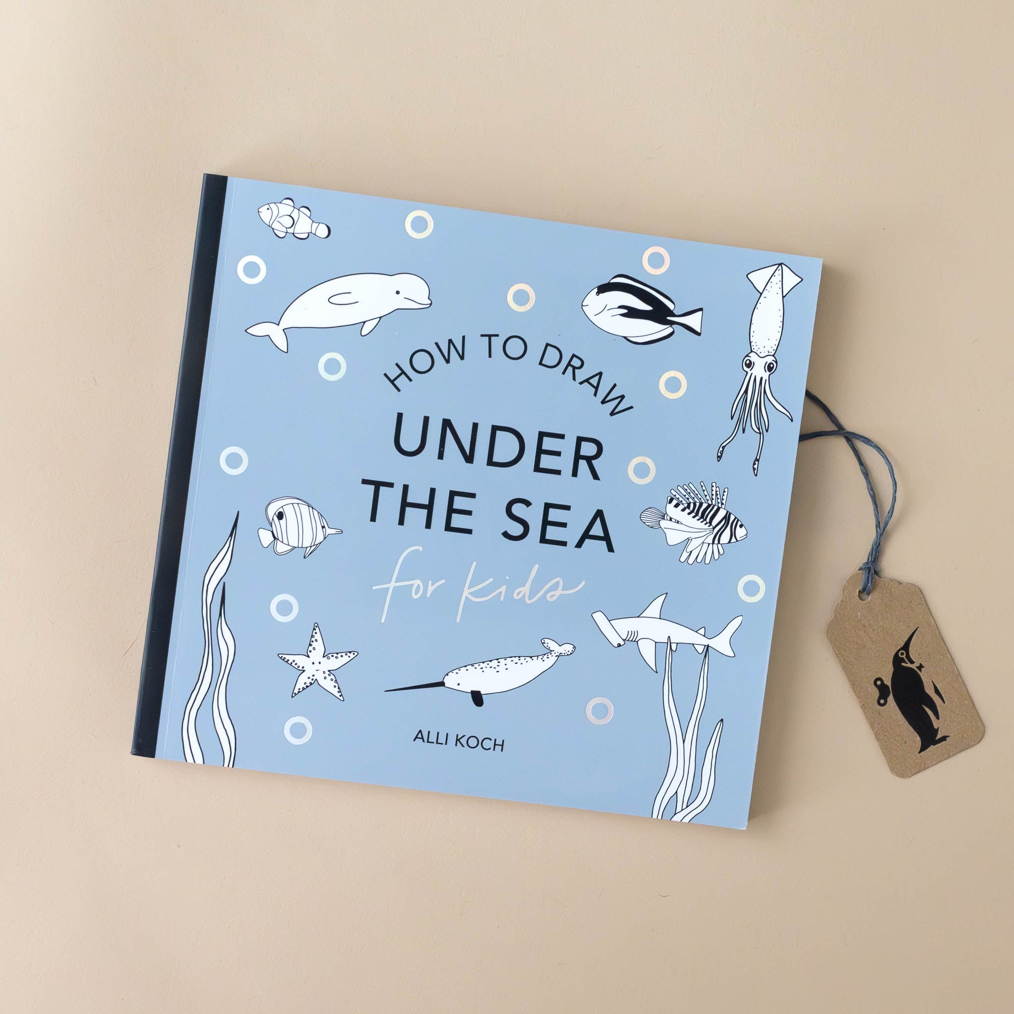 petite-how-to-draw-sea-life-for-kids-soft-blue-cover-with-black-and-white-illustrations-of-manatee-clownfish-star-fish-hammerhead-narwal-puffer-fish-squid