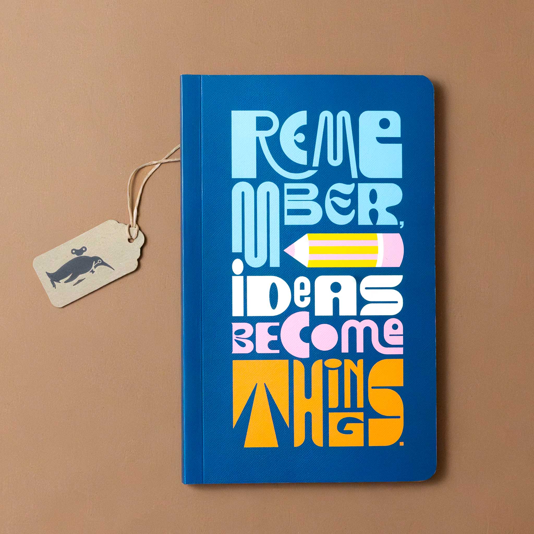 remember-ideas-become-things-write-now-journal-cover-with-colorful-text-and-a-pencil