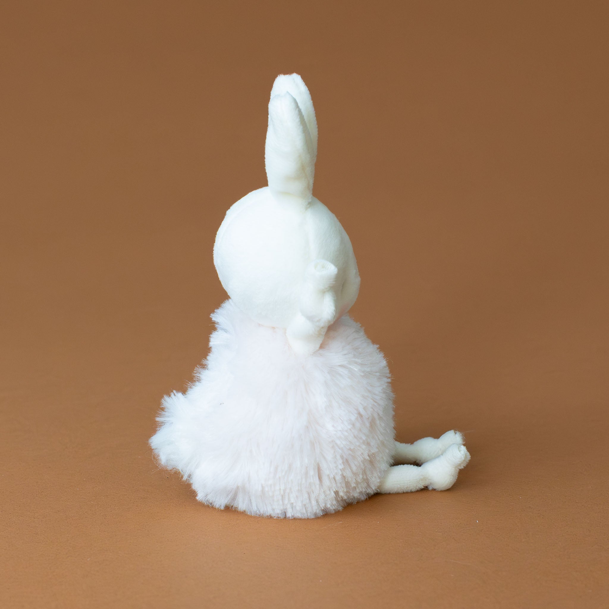 roly-poly-bunny-blossom-stuffed-animal-sitting-side-and-tail