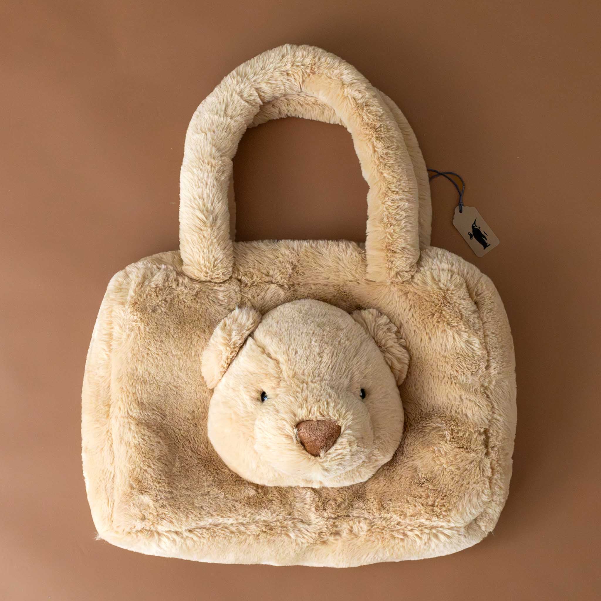 smudge-honey-brown-bear-tote-bag-with-bear-face-on-side-of-bag-and-two-straps-and-a-zipper