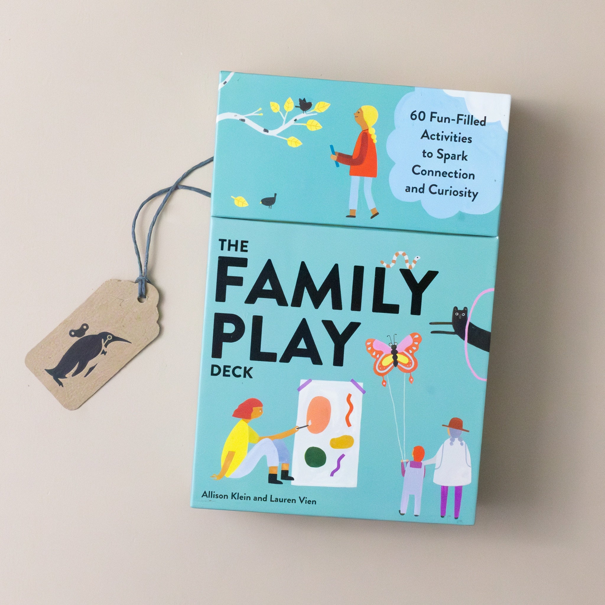 the-family-play-deck-box-with-families-engaged-in-nature-and-crafts