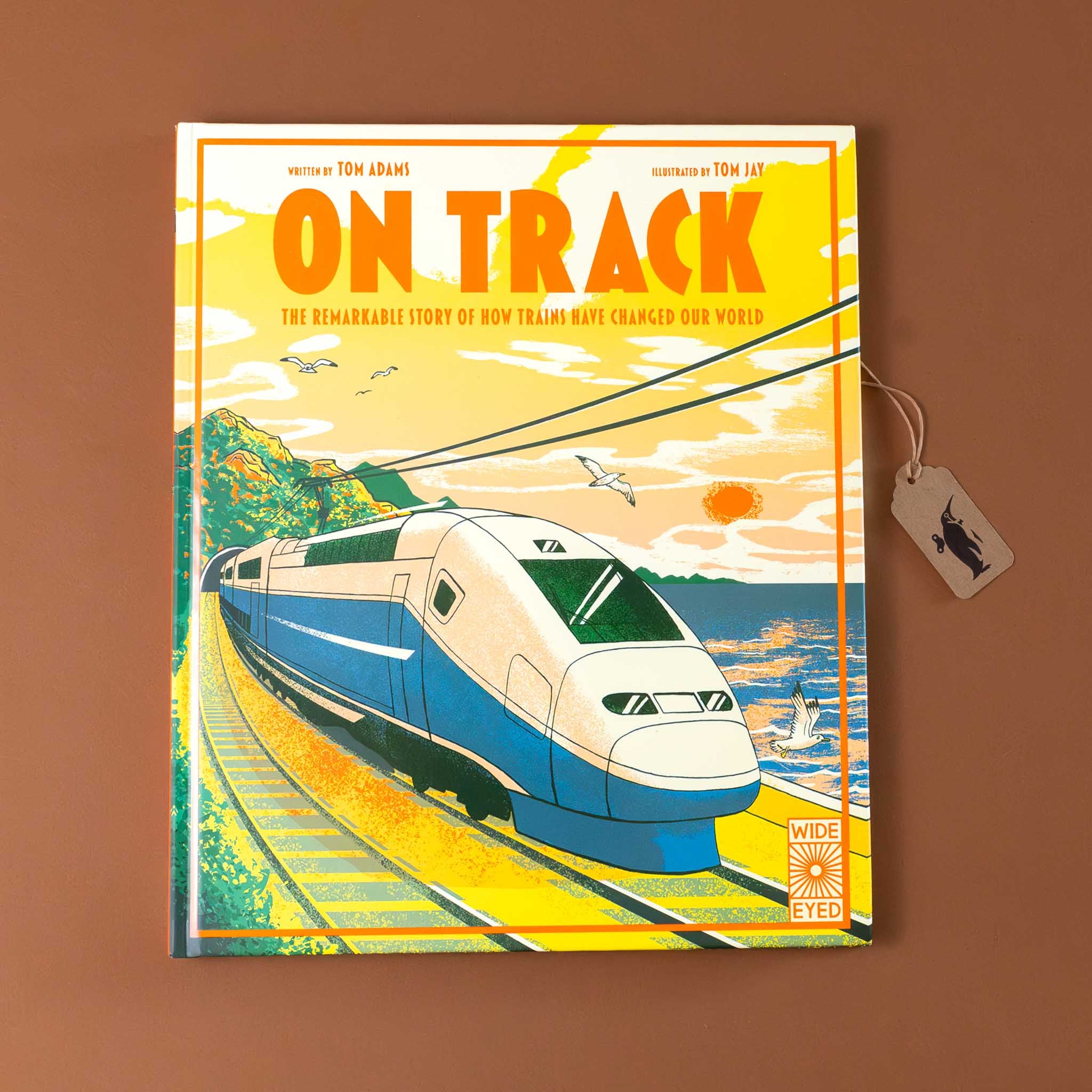 trains-book-a-remarkable-story-with-a-train-on-a-track-along-the-ocean