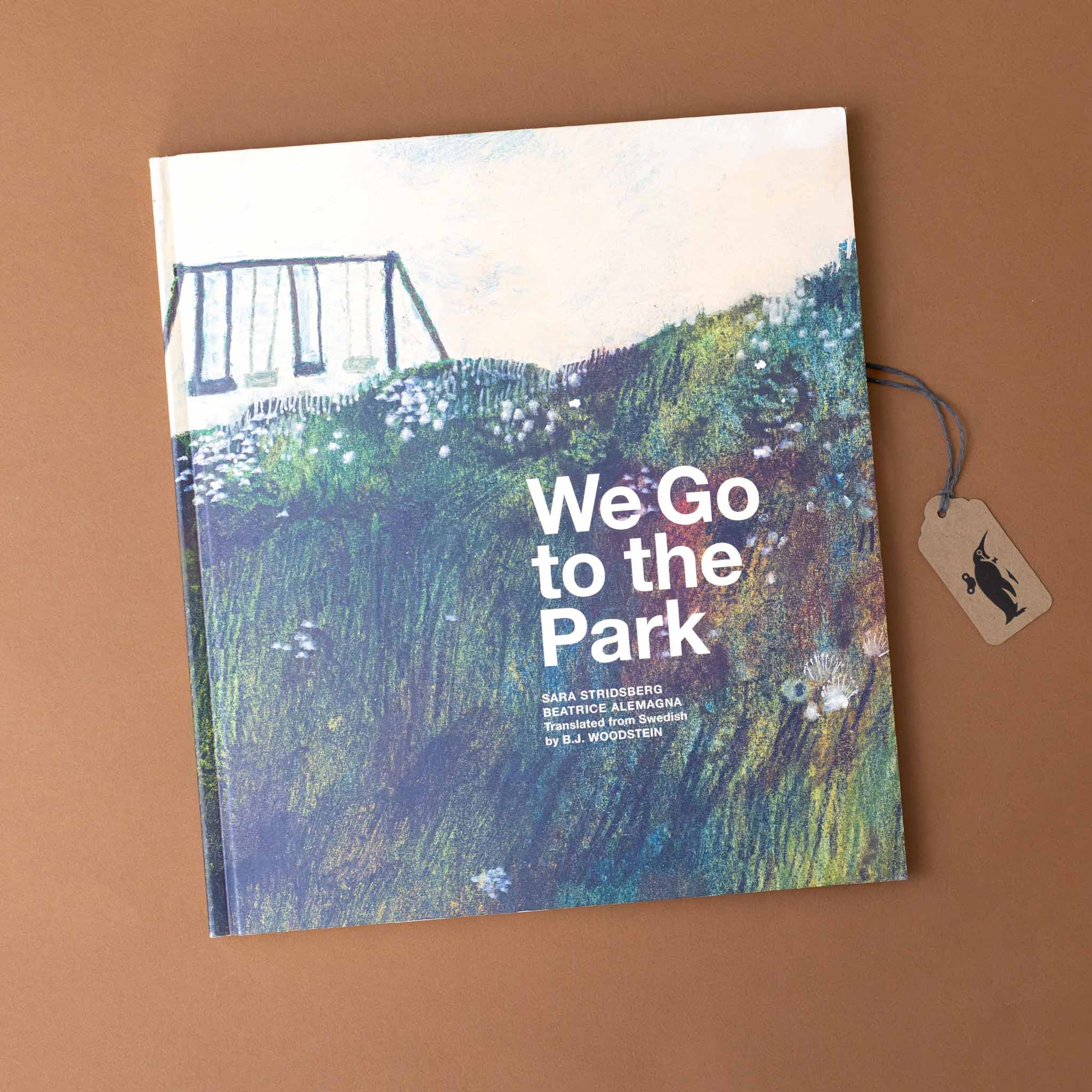 we-go-to-the-park-book-with-illustration-of-swing-set-in-a-field-on-cover