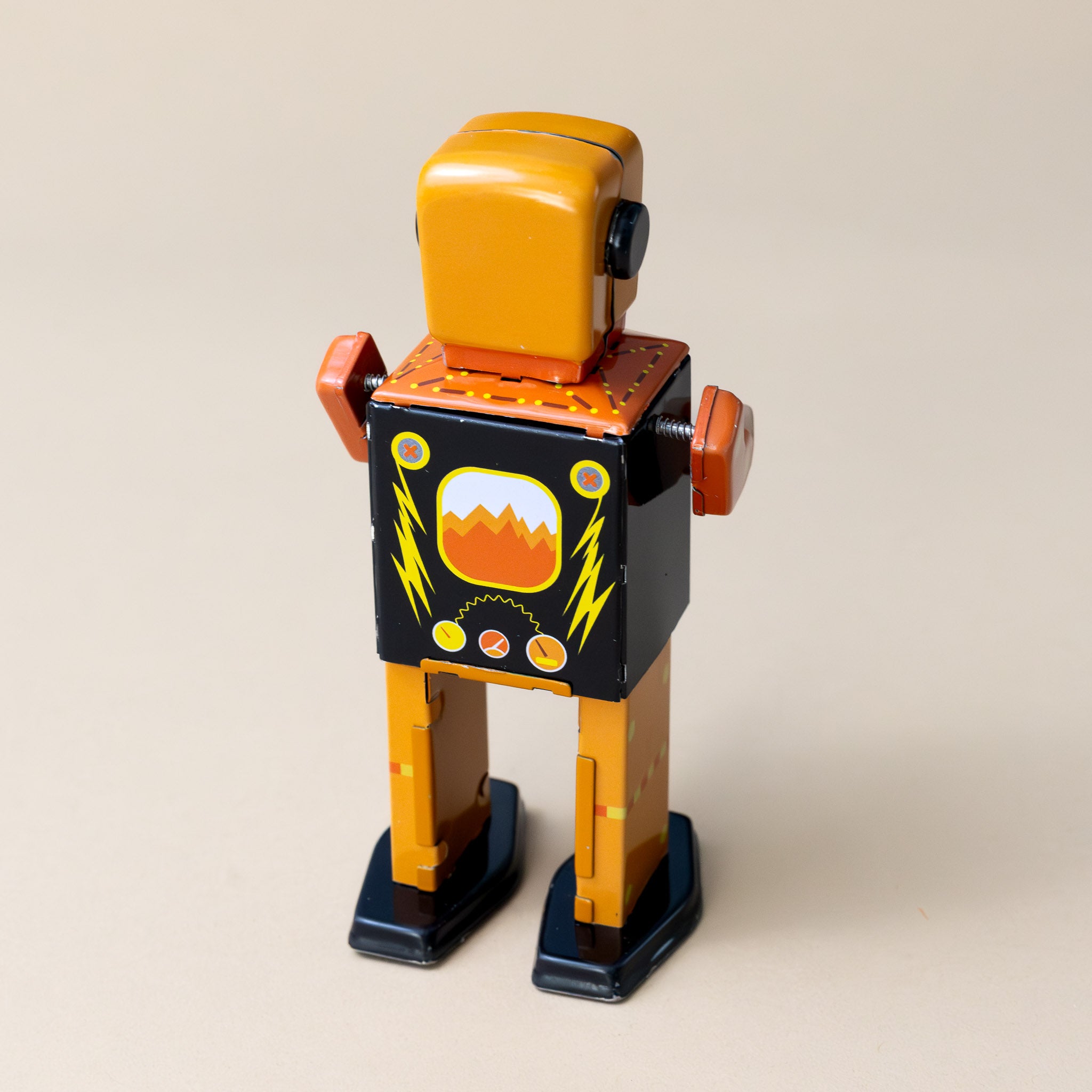 wind-up-tin-volcanobot-in-orange-and-black-with-yellow-bolt-details-back