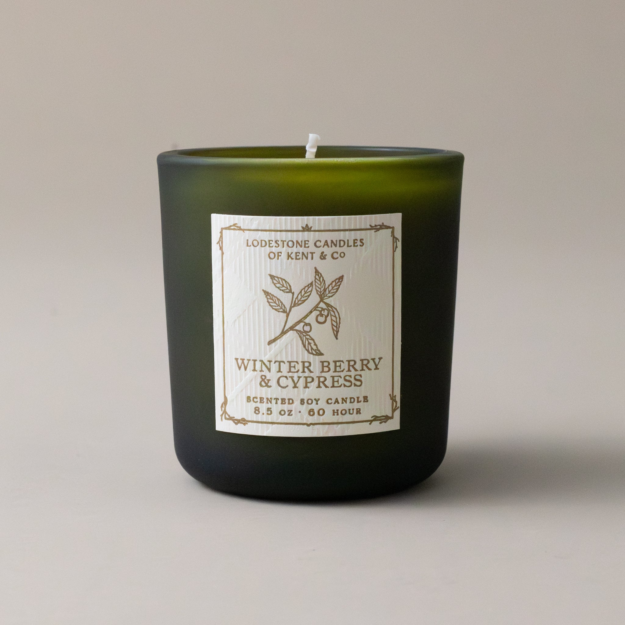 white-soy-winter-berry-and-cypress-candle-with-green-glass-jar