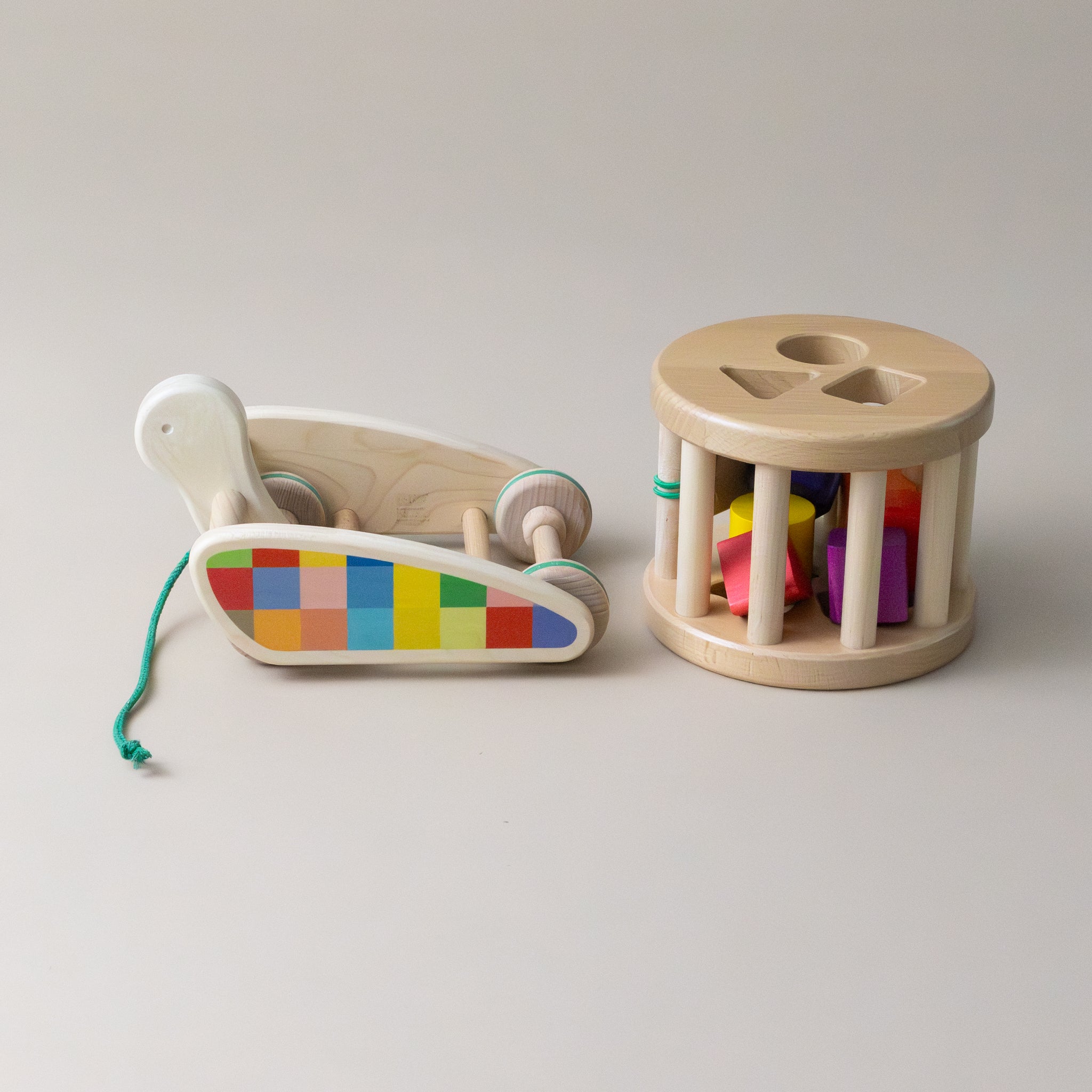 wooden-pull-along-snail-sorter-shape-sorter-is-removed-from-base-of-pull-along-toy