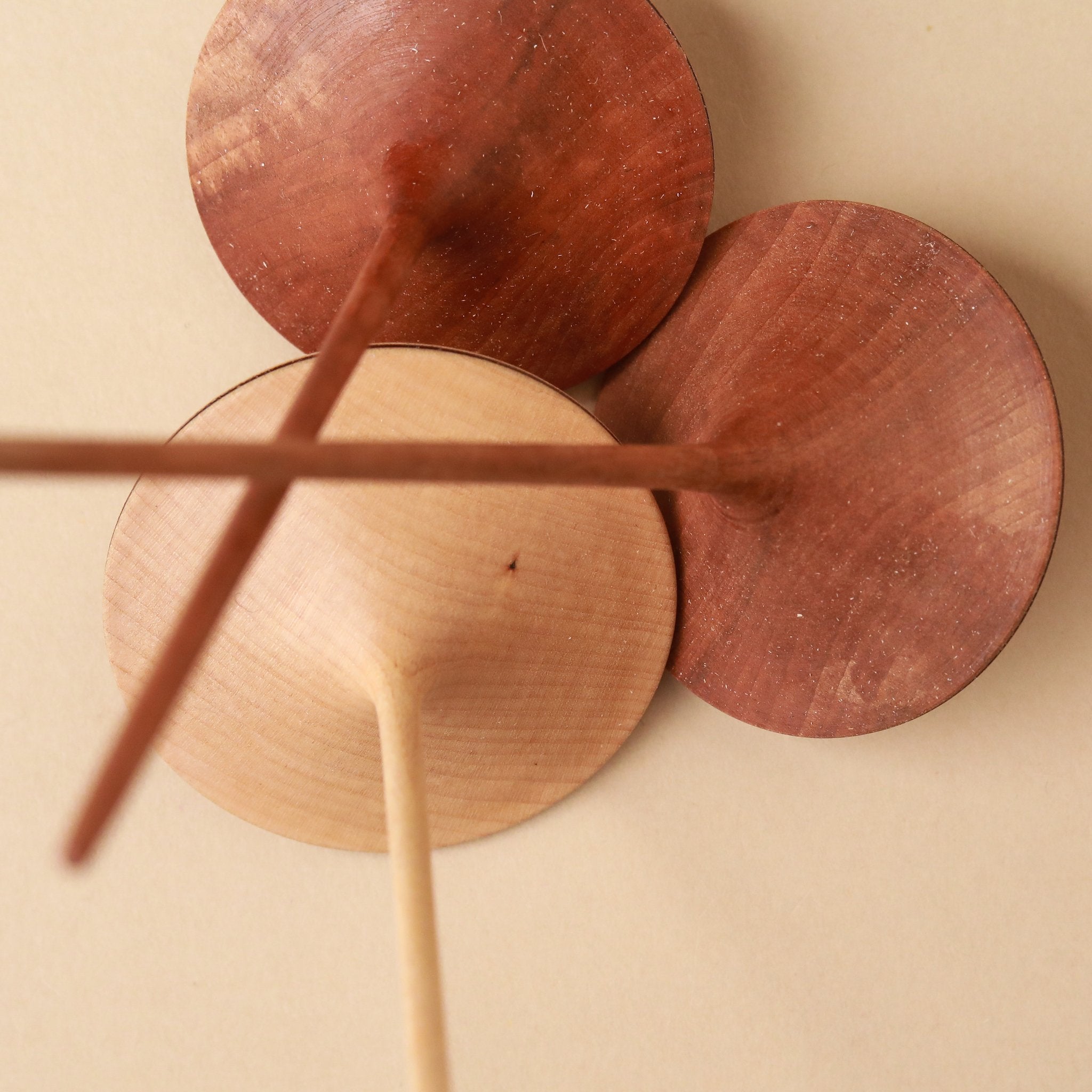 three-trumpo-wooden-spinning-tops