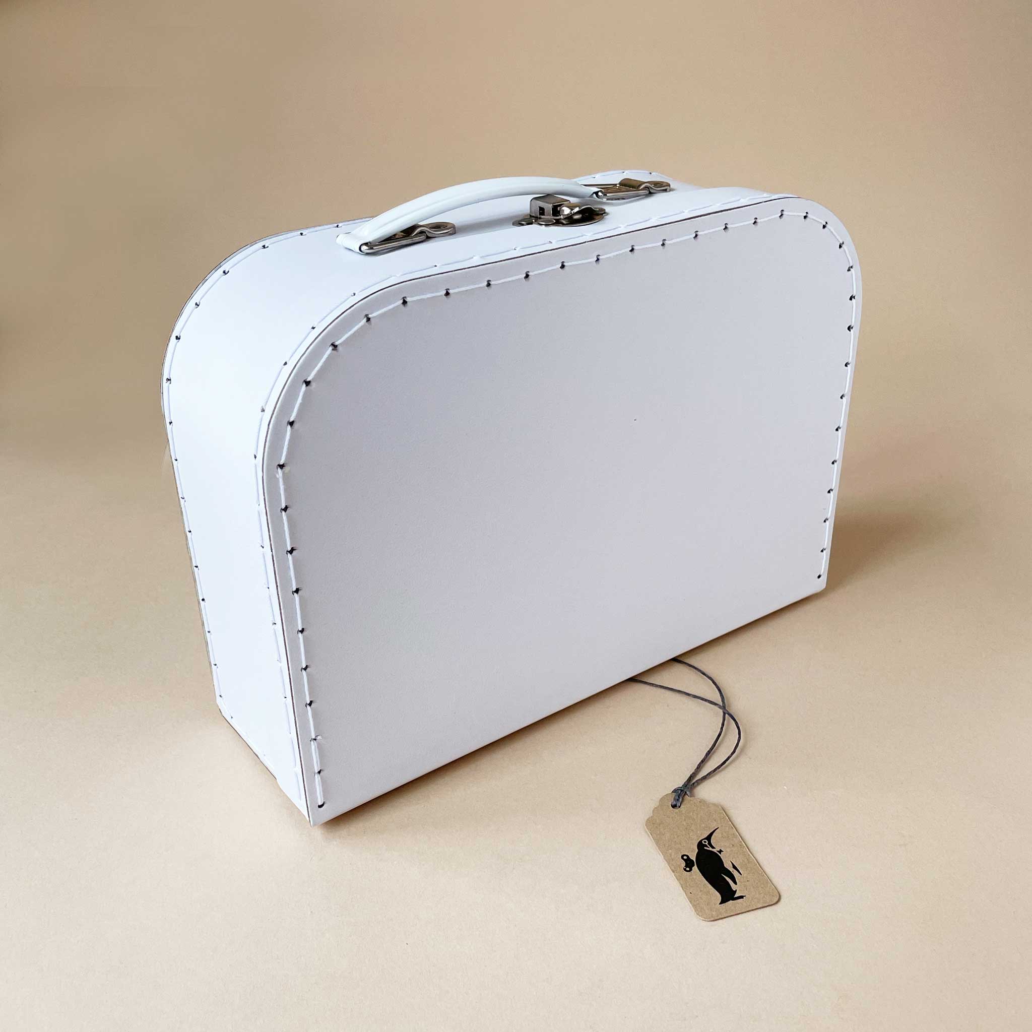 white-suitcase-with-silver-clasp