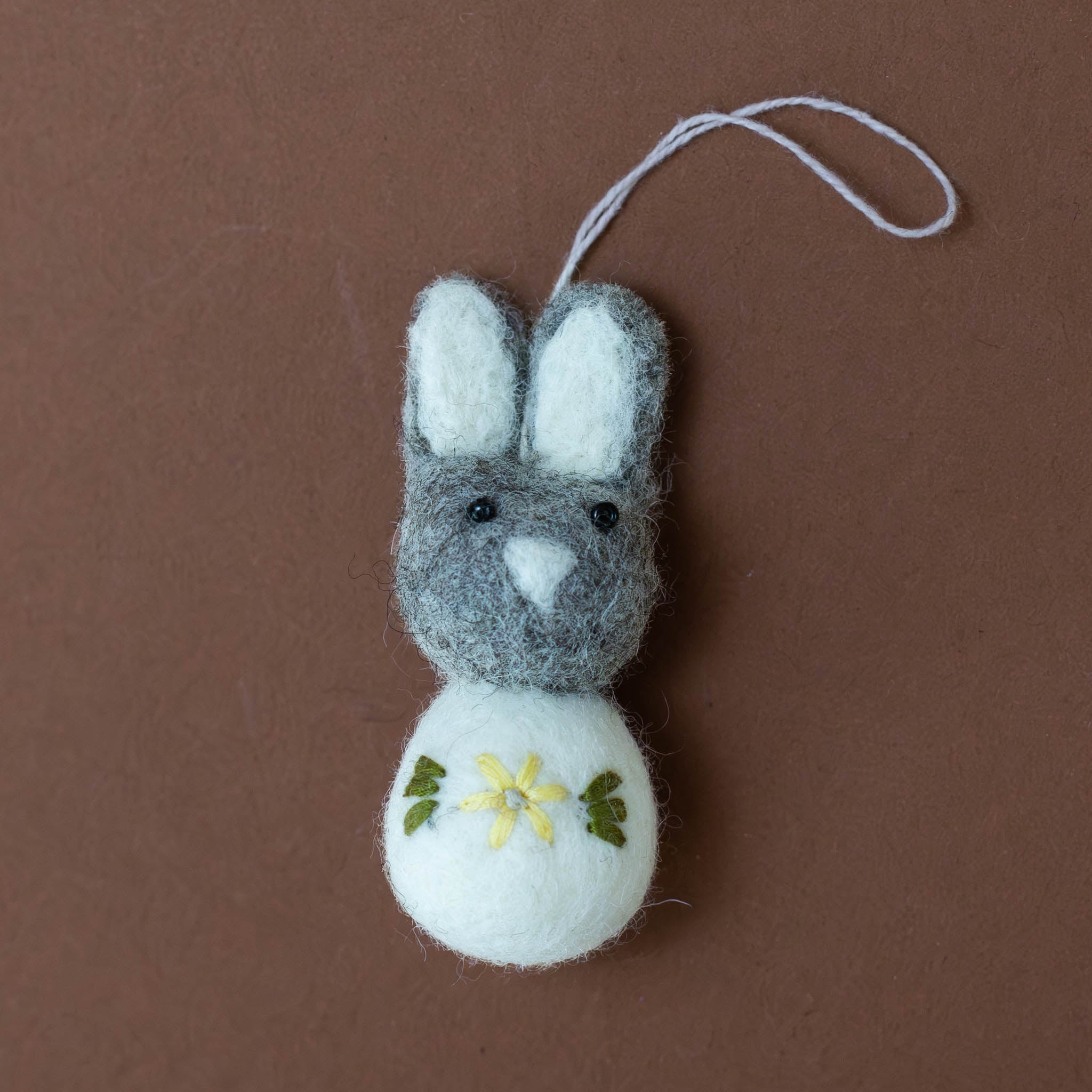 felted-pom-pom-bunny-ornament--grey-and-white-with-flower