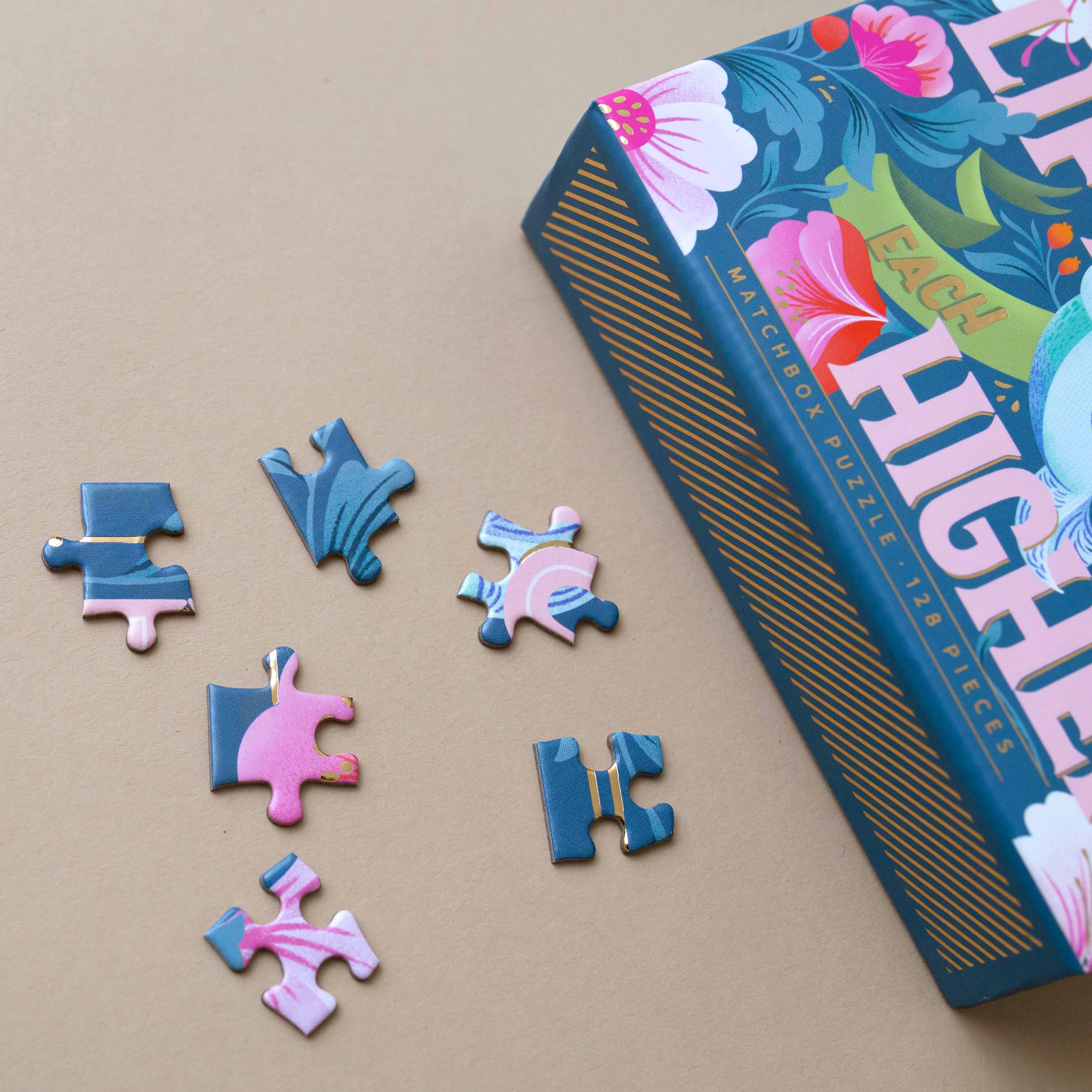 Lift Each Other Higher 128pc Matchbox Puzzle - Puzzles - pucciManuli