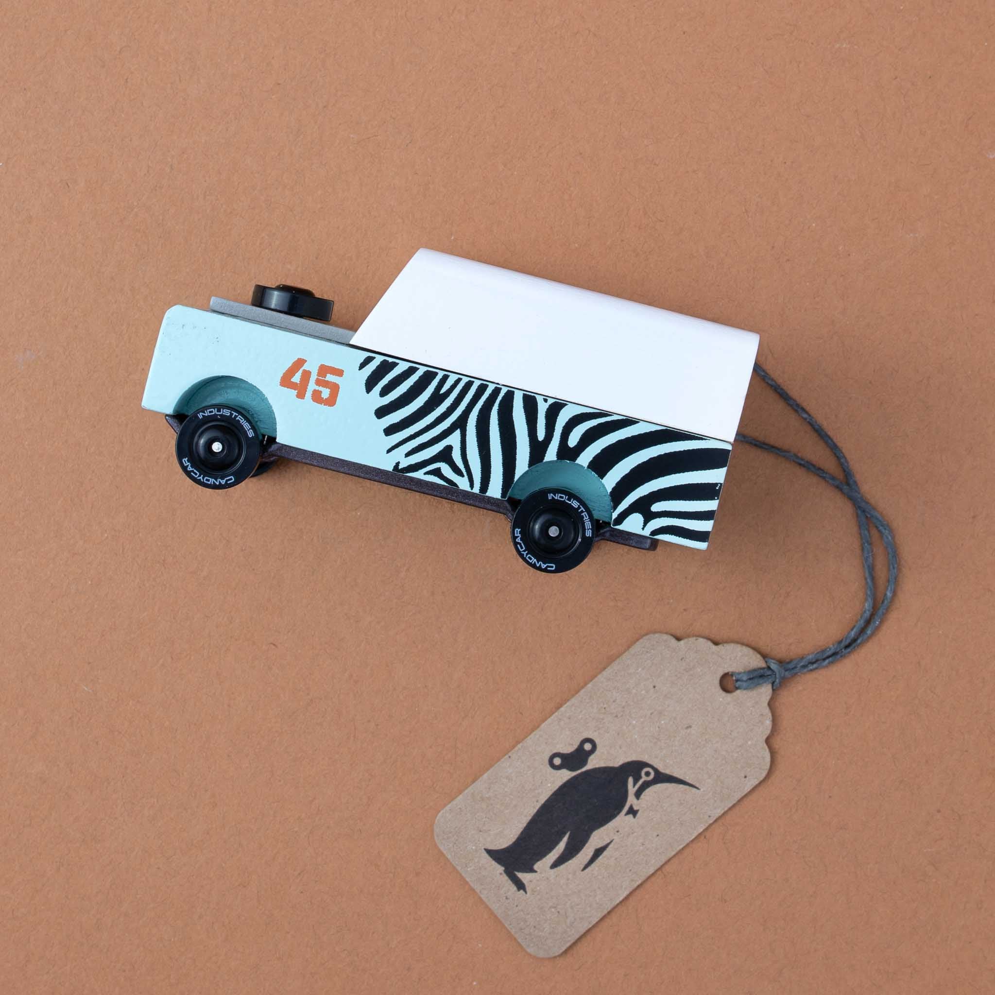 light-blue-car-with-zebra-stripes-and-orange-45